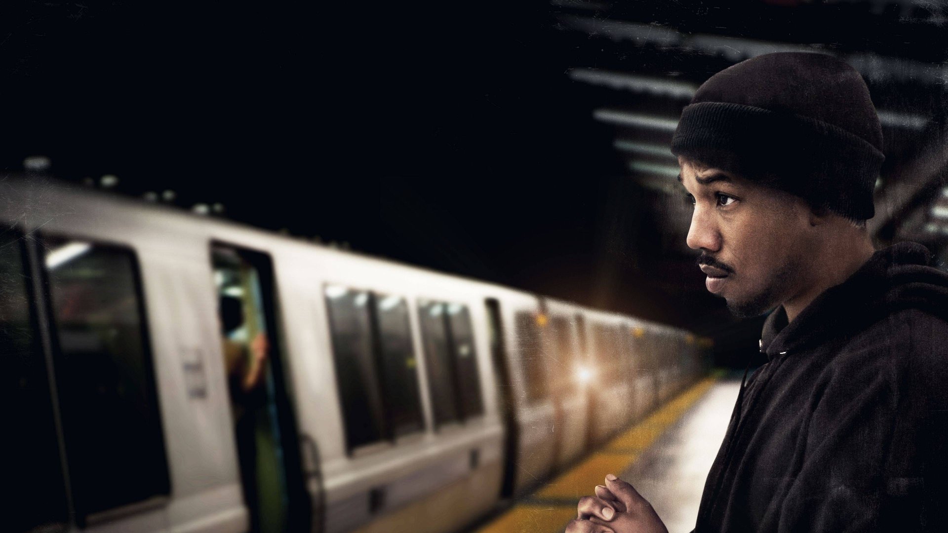 Cinematic background from Fruitvale Station 2013 - Oakland, California. Young Afro-American Oscar Grant crosses paths with family members, friends, enemies and strangers before facing his fate on the platform at Fruitvale Station, in the early morning hours of New Year's Day 2009.