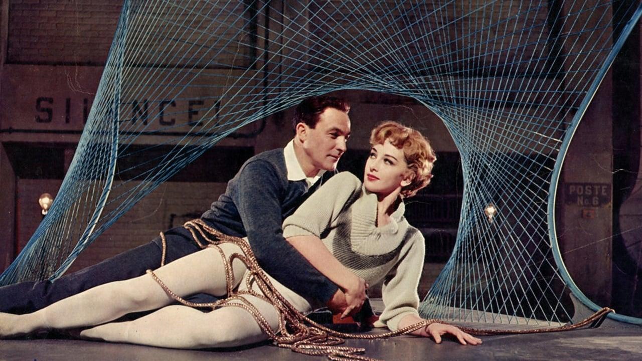 Cinematic background from Les Girls 1957 - After writing a tell-all book about her days in the dance troupe "Barry Nichols and Les Girls", Sybil Wren is sued for libeling her fellow dancer Angele. A Rashômon style narrative presents the story from three points of view where Sybil accuses Angele of having an affair with Barry, while Angele insists that it was actually Sybil who was having the affair. Finally, Barry gives his side of the story.