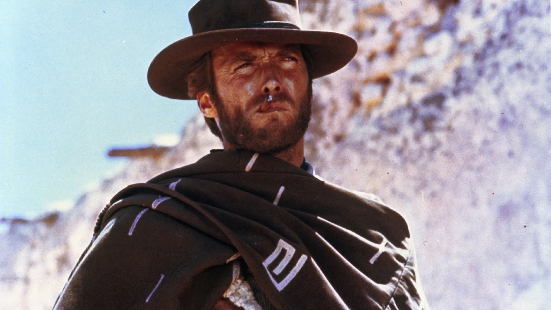 Cinematic background from A Fistful of Dollars 1964 - The Man With No Name enters the Mexican village of San Miguel in the midst of a power struggle among the three Rojo brothers and sheriff John Baxter. When a regiment of Mexican soldiers bearing gold intended to pay for new weapons is waylaid by the Rojo brothers, the stranger inserts himself into the middle of the long-simmering battle, selling false information to both sides for his own benefit.