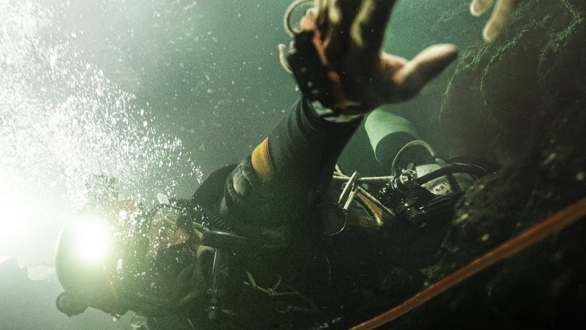 Cinematic background from Thirteen Lives 2022 - Based on the true nail-biting mission that captivated the world. Twelve boys and the coach of a Thai soccer team explore the Tham Luang cave when an unexpected rainstorm traps them in a chamber inside the mountain. Entombed behind a maze of flooded cave tunnels, they face impossible odds. A team of world-class divers navigate through miles of dangerous cave networks to discover that finding the boys is only the beginning.