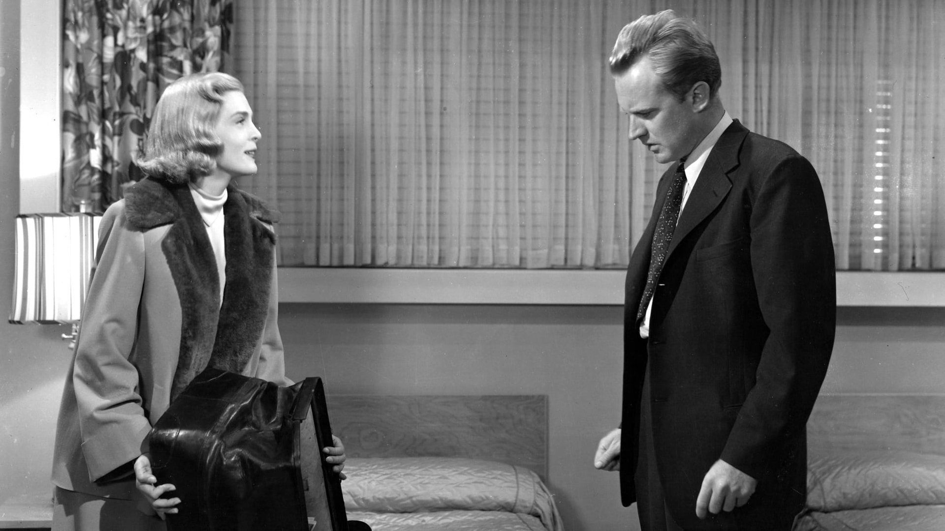 Cinematic background from Too Late for Tears 1949 - Through a fluke circumstance, a ruthless woman stumbles across a suitcase filled with $60,000, and is determined to hold onto it even if it means murder.