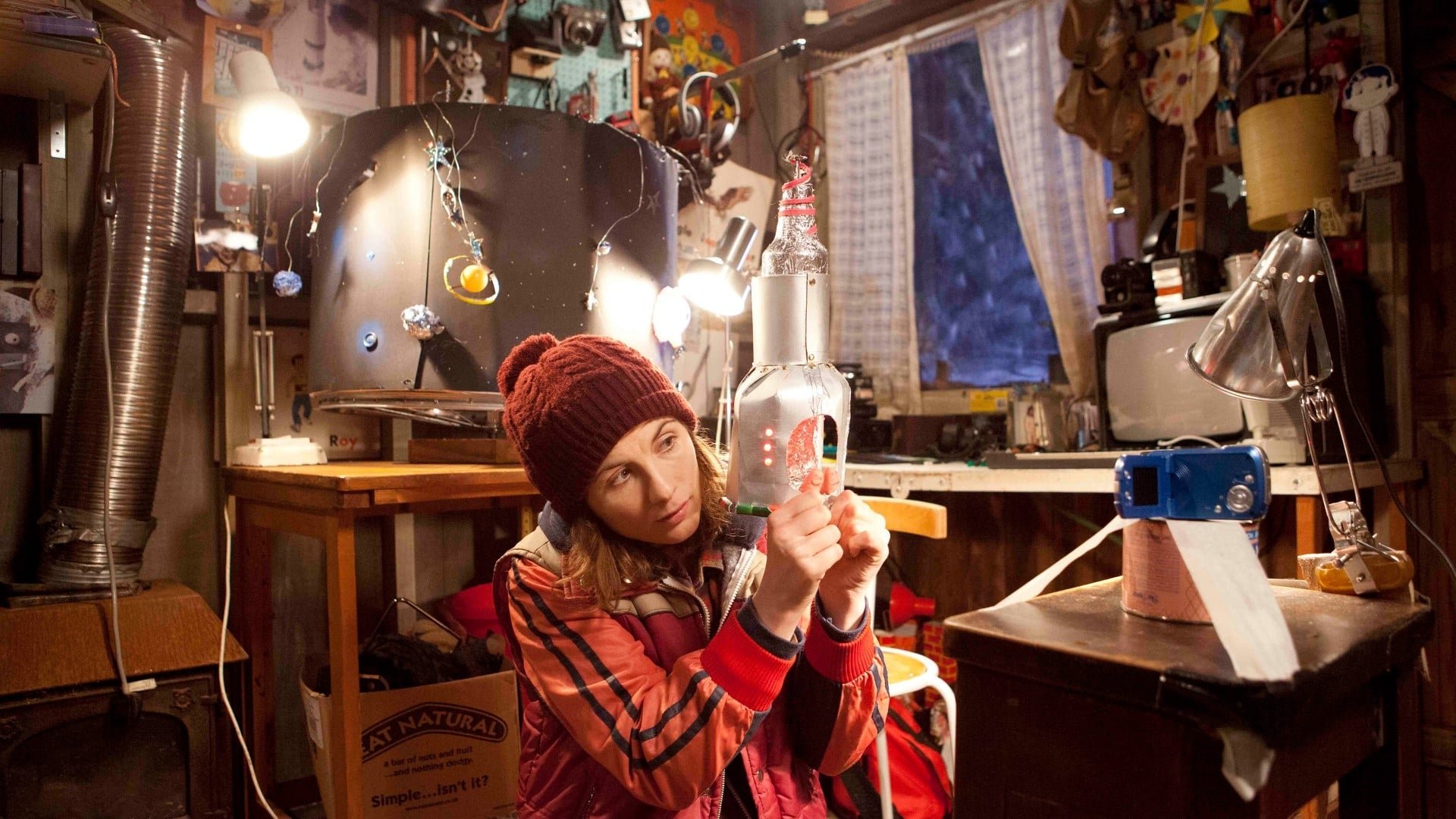 Cinematic background from Adult Life Skills 2016 - Anna is stuck: she’s approaching 30 and has just moved back to her rural home-town, and into a shed in her mother’s backyard. She spends her time working a menial job at a local boating center and hides in the depths of her imagination, making movies with her thumbs. Irritated by her childish behavior, Anna's mother insists that she move out of her shed and on with her life. When a troubled young boy starts hanging around, the two form an unlikely bond. Through their strange yet mutually beneficial friendship, Anna slowly begins to confront her perpetual state of arrested development.