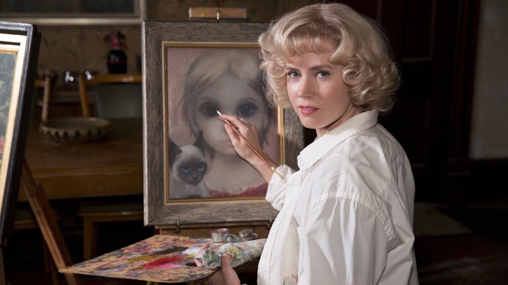 Cinematic background from Big Eyes 2014 - In the late 1950s and early '60s, artist Walter Keane achieves unbelievable fame and success with portraits of saucer-eyed waifs. However, no one realizes that his wife, Margaret, is the real painter behind the brush. Although Margaret is horrified to learn that Walter is passing off her work as his own, she is too meek to protest too loudly. It isn't until the Keanes' marriage comes to an end and a lawsuit follows that the truth finally comes to light.