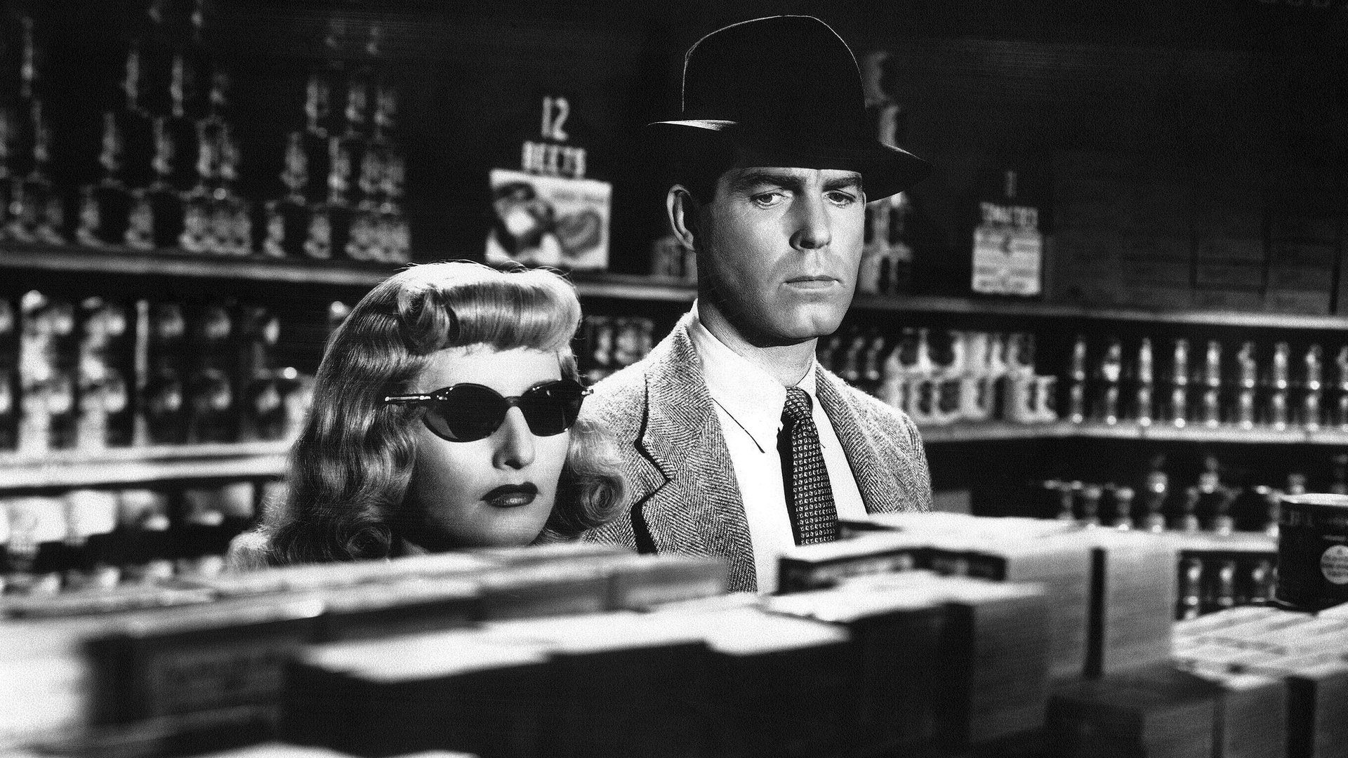 Cinematic background from Double Indemnity 1944 - A rich woman and a calculating insurance agent plot to kill her unsuspecting husband after he signs a double indemnity policy. Against a backdrop of distinctly Californian settings, the partners in crime plan the perfect murder to collect the insurance, which pays double if the death is accidental.