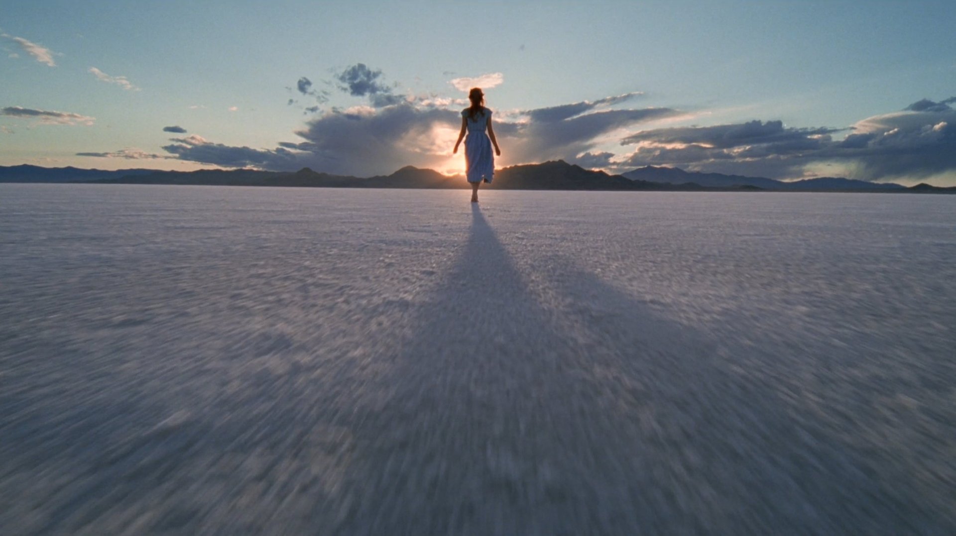 Cinematic background from The Tree of Life 2011 - The impressionistic story of a Texas family in the 1950s. The film follows the life journey of the eldest son, Jack, through the innocence of childhood to his disillusioned adult years as he tries to reconcile a complicated relationship with his father. Jack finds himself a lost soul in the modern world, seeking answers to the origins and meaning of life while questioning the existence of faith.