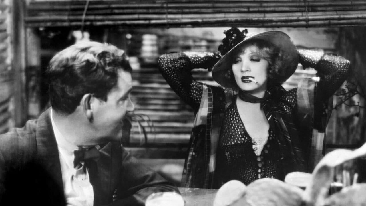 Cinematic background from Blonde Venus 1932 - American chemist Ned Faraday marries a German entertainer and starts a family. However, he becomes poisoned with Radium and needs an expensive treatment in Germany to have any chance at being cured. Wife Helen returns to night club work to attempt to raise the money and becomes popular as the Blonde Venus. In an effort to get enough money sooner, she prostitutes herself to millionaire Nick Townsend.