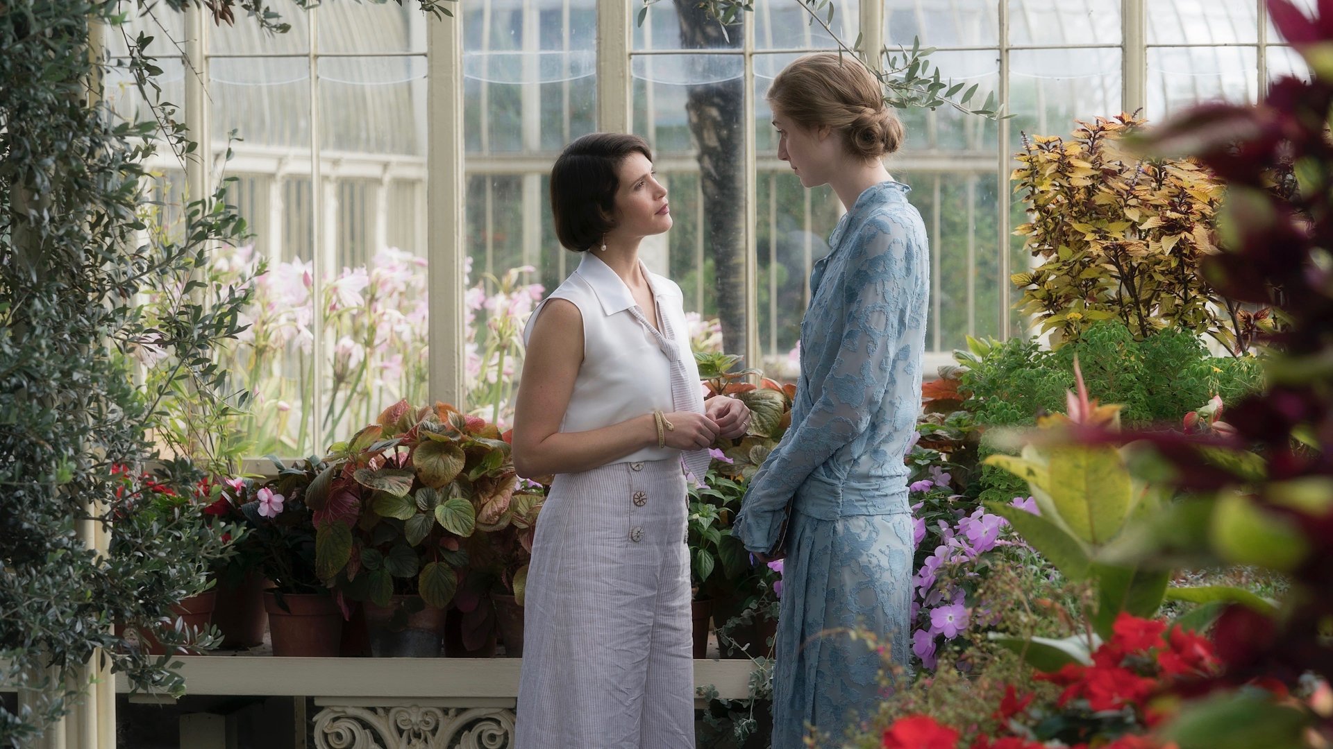 Cinematic background from Vita & Virginia 2018 - Socialite Vita Sackville-West and literary icon Virginia Woolf run in different circles in 1920s London. Despite the odds, the two forge an unconventional affair, set against the backdrop of their own strikingly contemporary marriages.