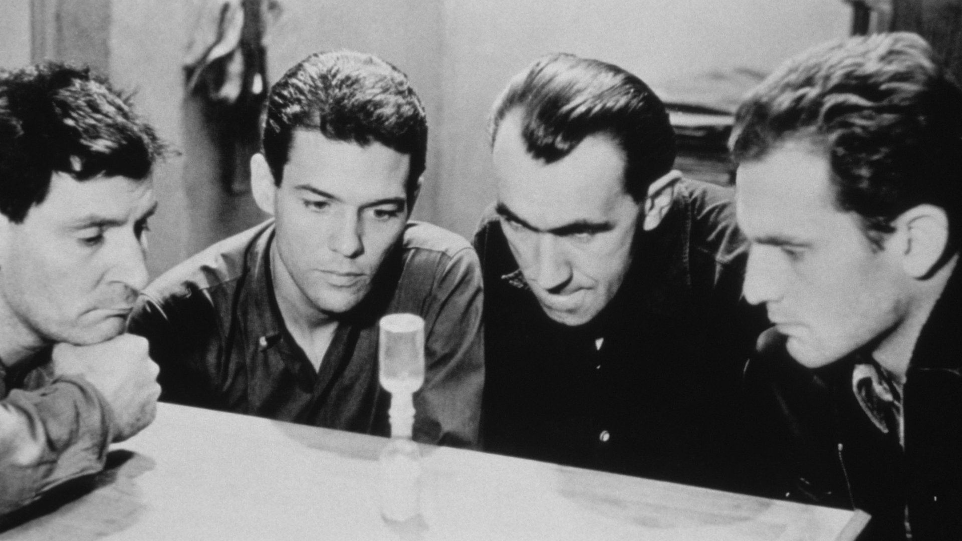 Cinematic background from The Hole 1960 - Four prison inmates have been hatching a plan to literally dig out of jail when another prisoner, Claude Gaspard, is moved into their cell. They take a risk and share their plan with the newcomer. Over the course of three days, the prisoners and friends break through the concrete floor using a bed post and begin to make their way through the sewer system -- yet their escape is anything but assured.