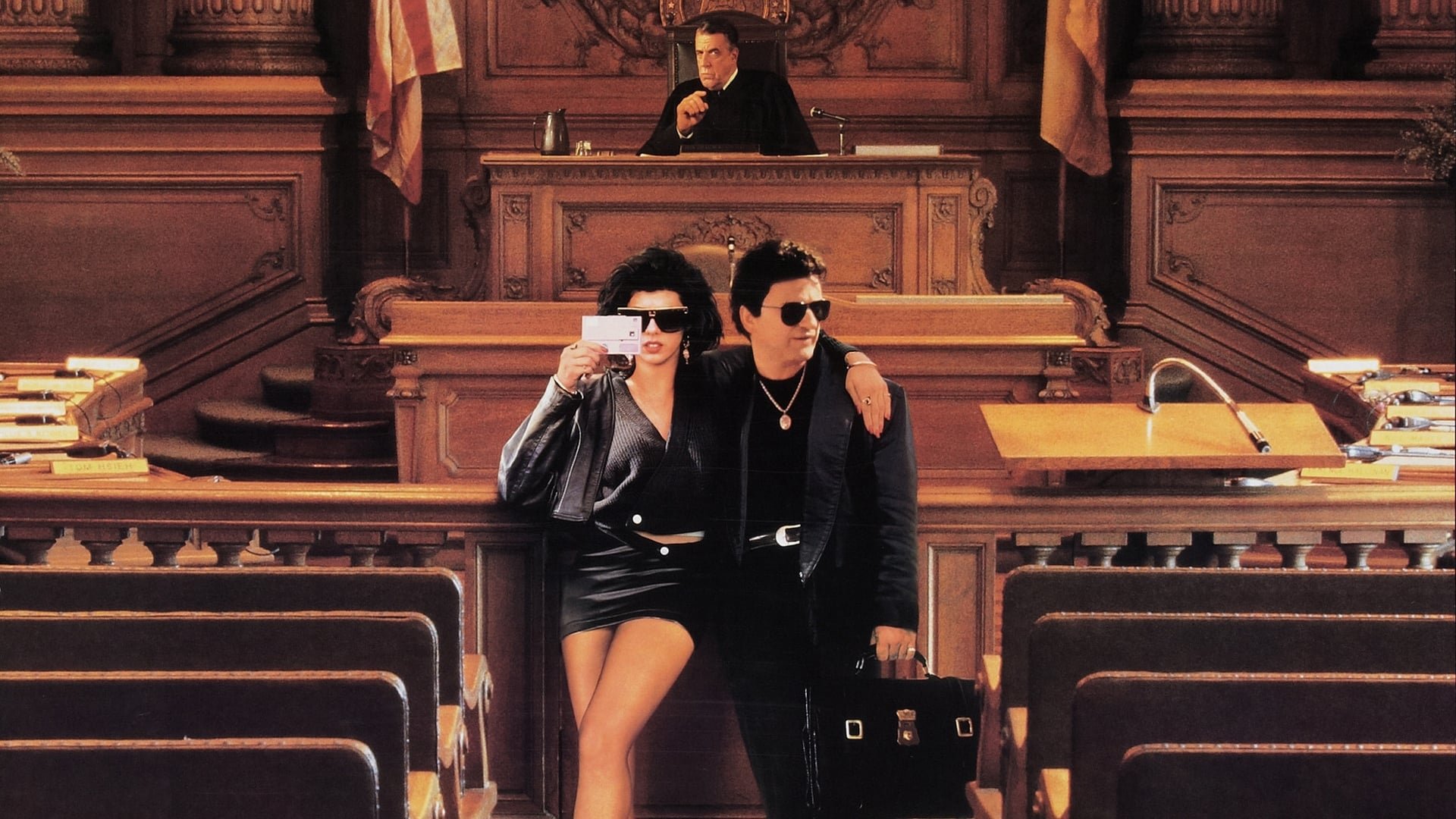 Cinematic background from My Cousin Vinny 1992 - Two carefree pals traveling through Alabama are mistakenly arrested, and charged with murder. Fortunately, one of them has a cousin who's a lawyer - Vincent Gambini, a former auto mechanic from Brooklyn who just passed his bar exam after his sixth try. When he arrives with his leather-clad girlfriend, to try his first case, it's a real shock - for him and the Deep South!
