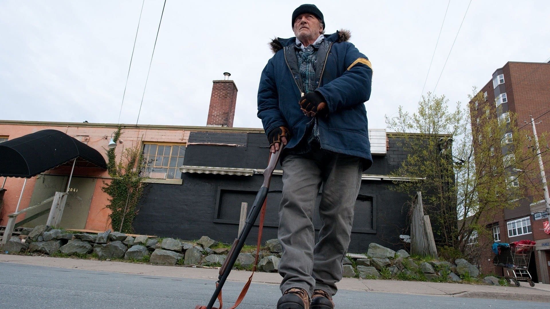 Cinematic background from Hobo with a Shotgun 2011 - A vigilante homeless man pulls into a new city and finds himself trapped in urban chaos, a city where crime rules and where the city's crime boss reigns. Seeing an urban landscape filled with armed robbers, corrupt cops, abused prostitutes and even a pedophile Santa, the Hobo goes about bringing justice to the city the best way he knows how - with a 20-gauge shotgun. Mayhem ensues when he tries to make things better for the future generation. Street justice will indeed prevail.