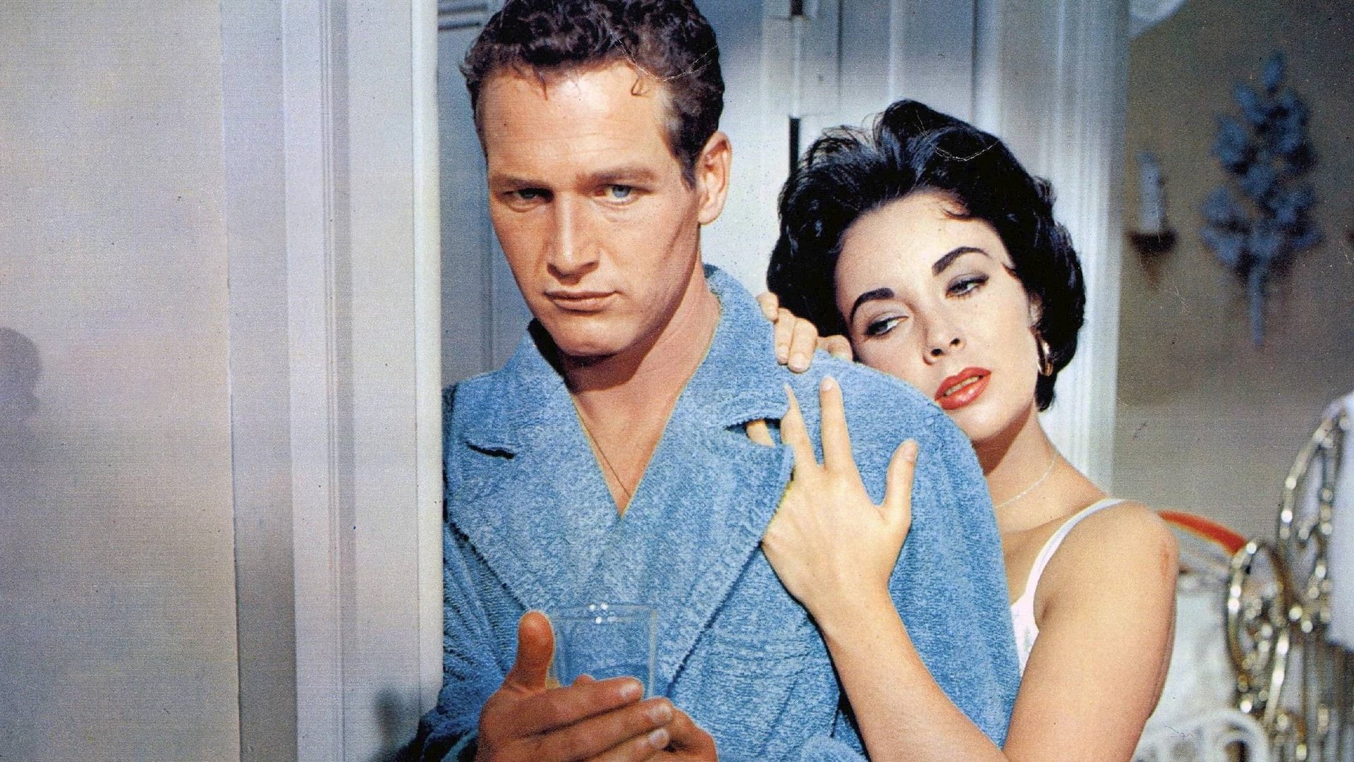 Cinematic background from Cat on a Hot Tin Roof 1958 - An alcoholic ex-football player drinks his days away, having failed to come to terms with his sexuality and his real feelings for his football buddy who died after an ambiguous accident. His wife is crucified by her desperation to make him desire her: but he resists the affections of his wife. His reunion with his father—who is dying of cancer—jogs a host of memories and revelations for both father and son.