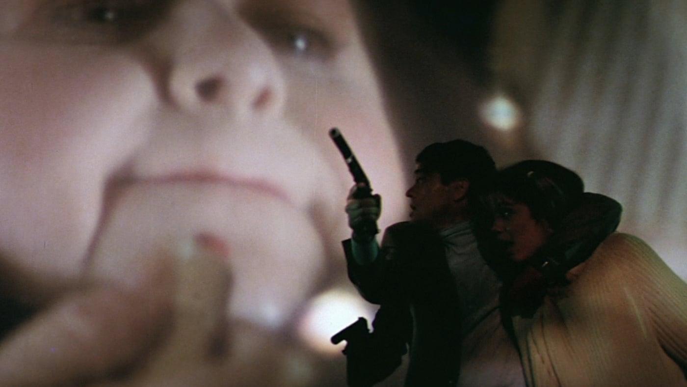 Cinematic background from Anguish 1987 - An ophthalmologist's assistant with an unhealthy interest in human eyeballs goes on a killing spree to collect eyeballs for his overbearing mother's collection. Reality soon takes a bizarre turn, both for the characters and the audience.