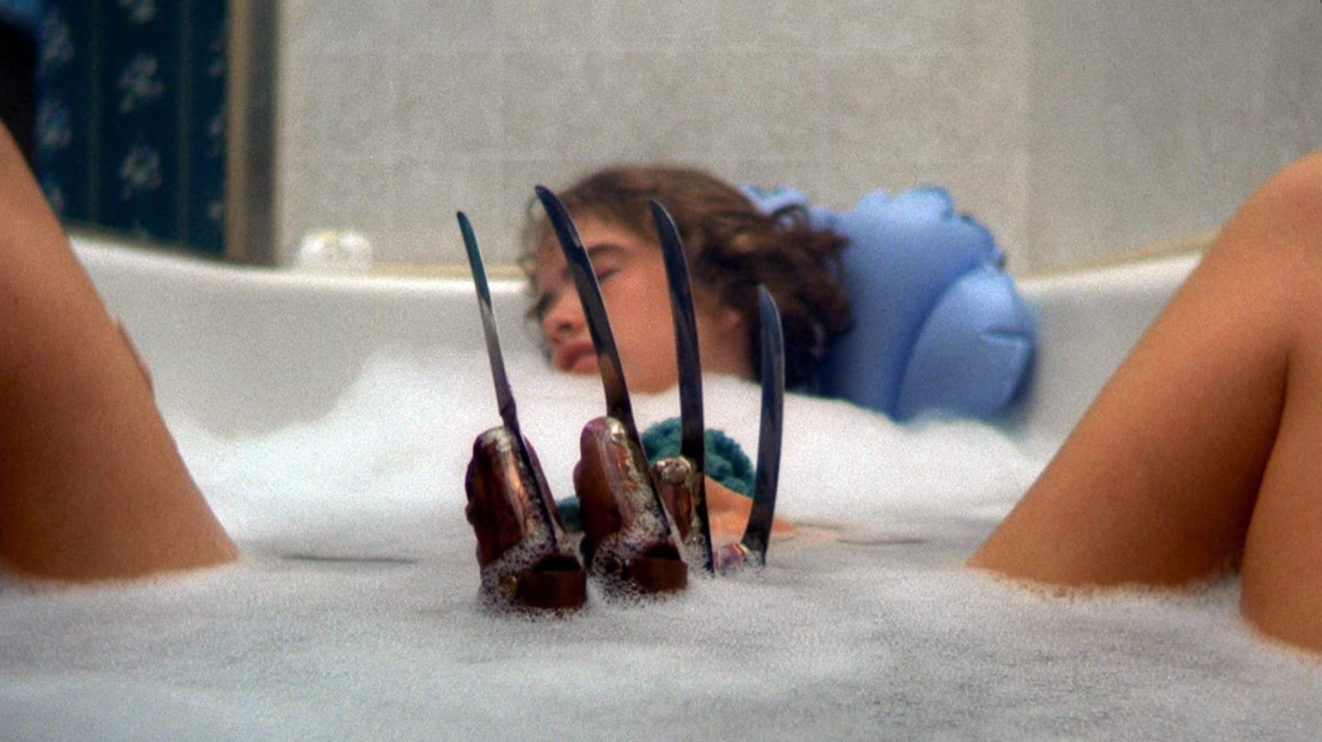 Cinematic background from A Nightmare on Elm Street 1984 - Teenagers in a small town are dropping like flies, apparently in the grip of mass hysteria causing their suicides. A cop's daughter, Nancy Thompson, traces the cause to child molester Fred Krueger, who was burned alive by angry parents many years before. Krueger has now come back in the dreams of his killers' children, claiming their lives as his revenge. Nancy and her boyfriend, Glen, must devise a plan to lure the monster out of the realm of nightmares and into the real world...