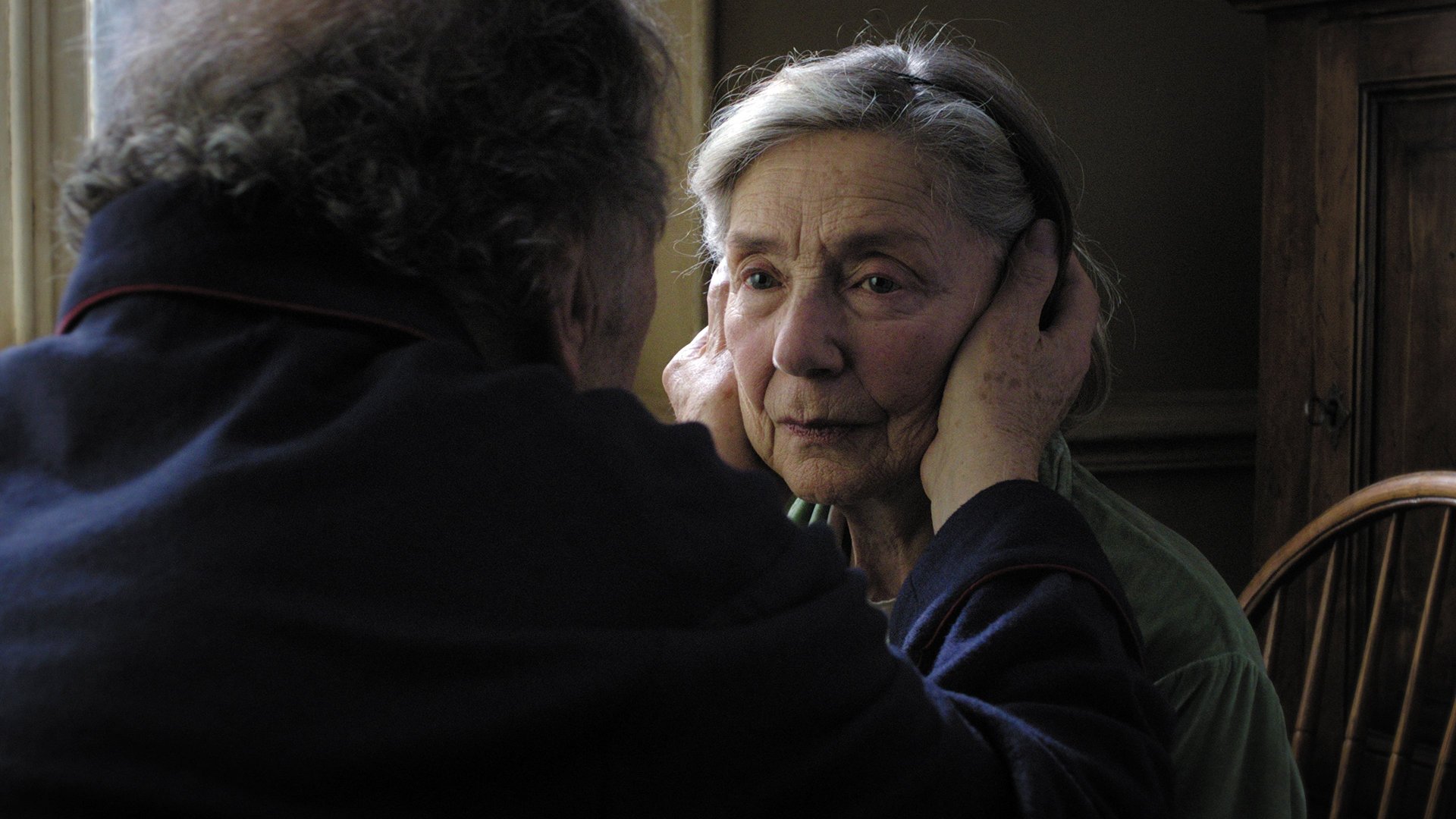 Cinematic background from Amour 2012 - Georges and Anne are in their eighties. They are cultivated, retired music teachers. Their daughter, who is also a musician, lives abroad with her family. One day, Anne has a stroke, and the couple's bond of love is severely tested.