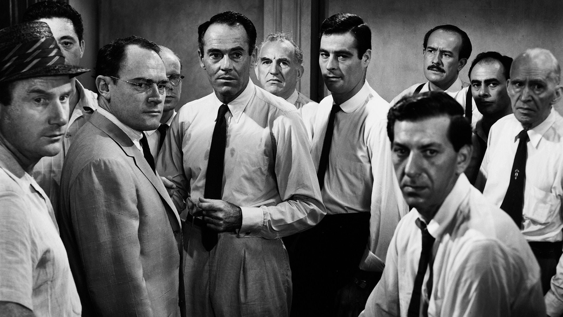Cinematic background from 12 Angry Men 1957 - The defense and the prosecution have rested and the jury is filing into the jury room to decide if a young Spanish-American is guilty or innocent of murdering his father. What begins as an open and shut case soon becomes a mini-drama of each of the jurors' prejudices and preconceptions about the trial, the accused, and each other.