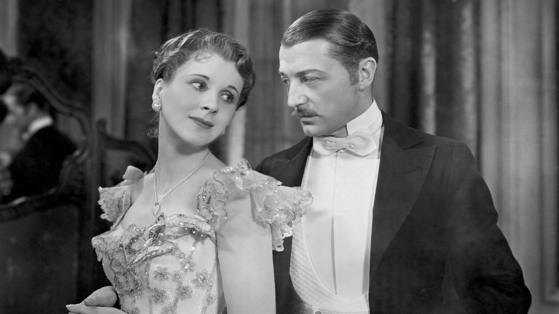 Cinematic background from Cavalcade 1933 - A cavalcade of English life from New Year's Eve 1899 until 1933 is seen through the eyes of well-to-do Londoners Jane and Robert Marryot. Amongst events touching their family are the Boer War, the death of Queen Victoria, the sinking of the Titanic, and the Great War.