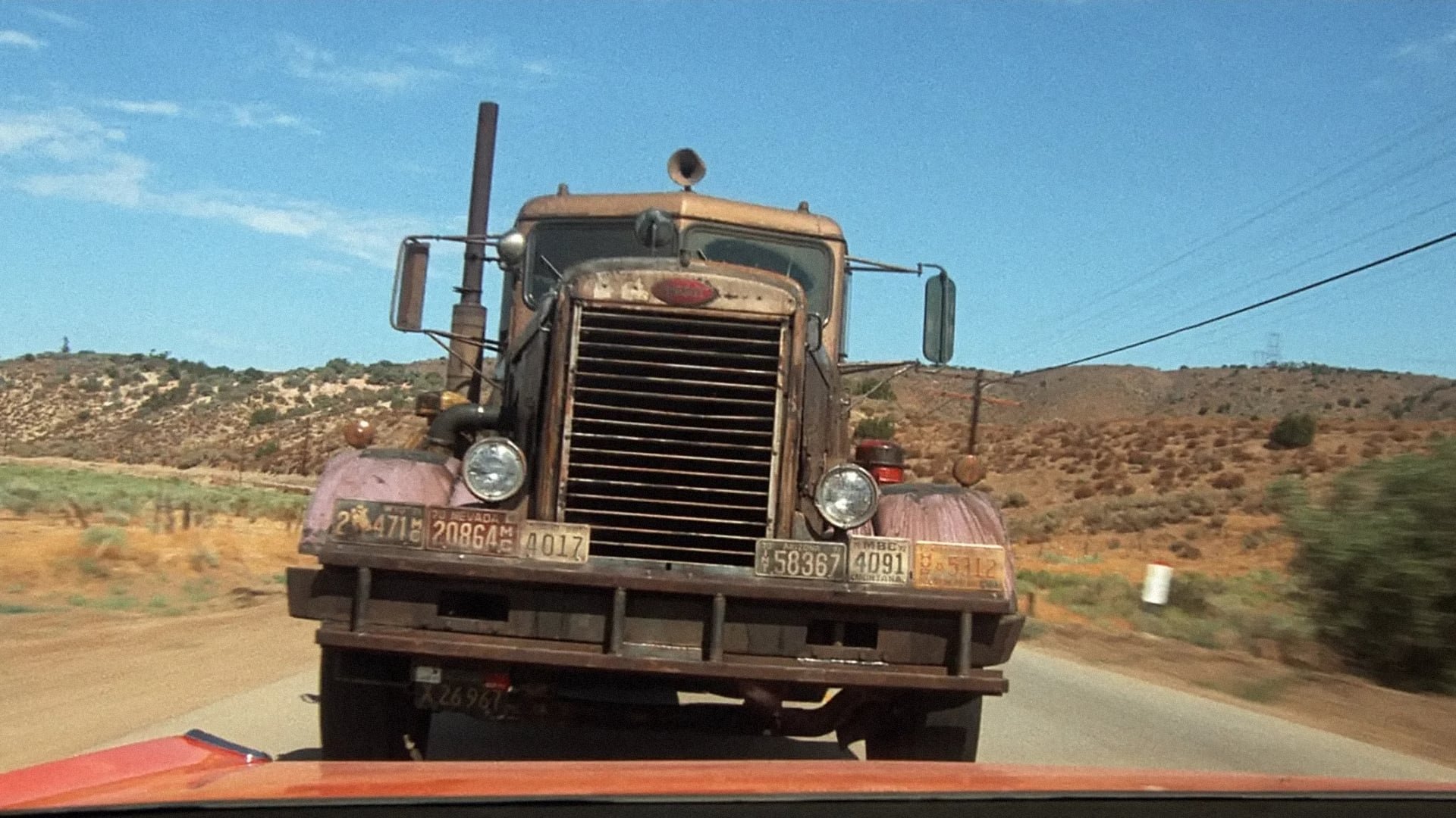Cinematic background from Duel 1971 - Traveling businessman David Mann angers the driver of a rusty tanker while crossing the California desert. A simple trip turns deadly, as Mann struggles to stay on the road while the tanker plays cat and mouse with his life.
