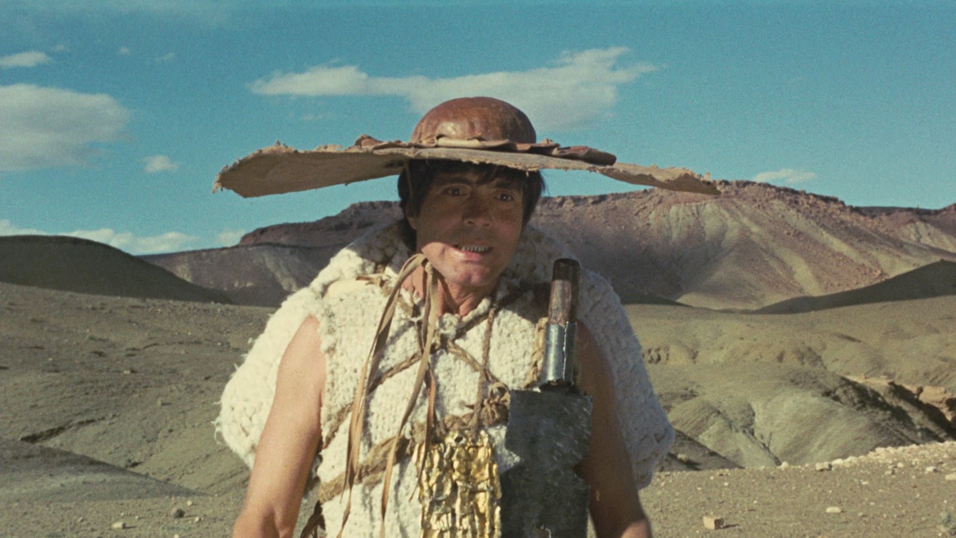 Cinematic background from Oedipus Rex 1967 - In pre-war Italy, a young couple have a baby boy. The father, however, is jealous of his son - and the scene moves to antiquity, where the baby is taken into the desert to be killed. He is rescued, given the name Edipo (Oedipus), and brought up by the King and Queen of Corinth as their son. One day an oracle informs Edipo that he is destined to kill his father and marry his mother. Horrified, he flees Corinth and his supposed parents - only to get into a fight and kill an older man on the road…