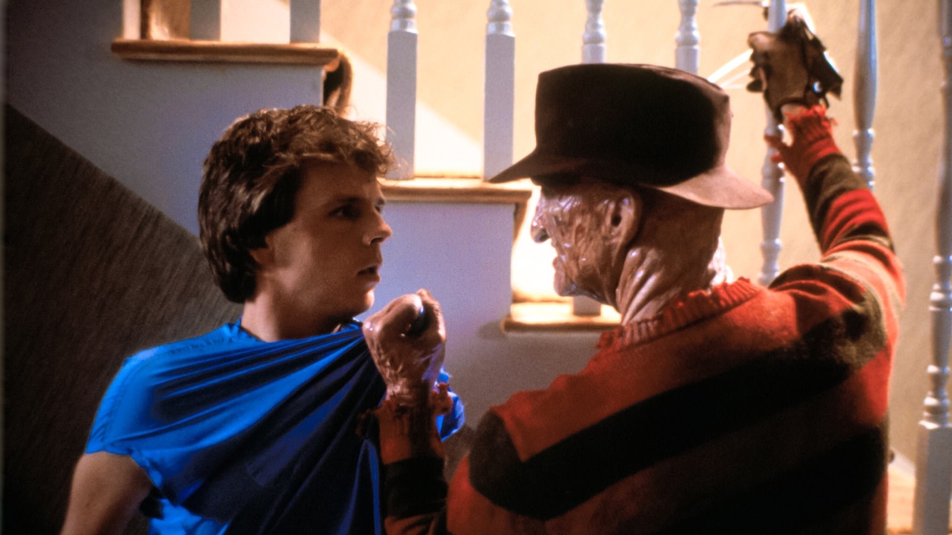Cinematic background from A Nightmare on Elm Street 2: Freddy's Revenge 1985 - Jesse Walsh moves with his family into the home of the lone survivor from a series of attacks by dream-stalking monster Freddy Krueger. There, Jesse is bedeviled by nightmares and inexplicably violent impulses. It turns out Freddy needs a host body to carry out his gruesome vendetta against the youth of Springwood, Ohio. While Freddy gains influence, Jesse and his girlfriend, Lisa race against the clock trying to figure out what's going on.