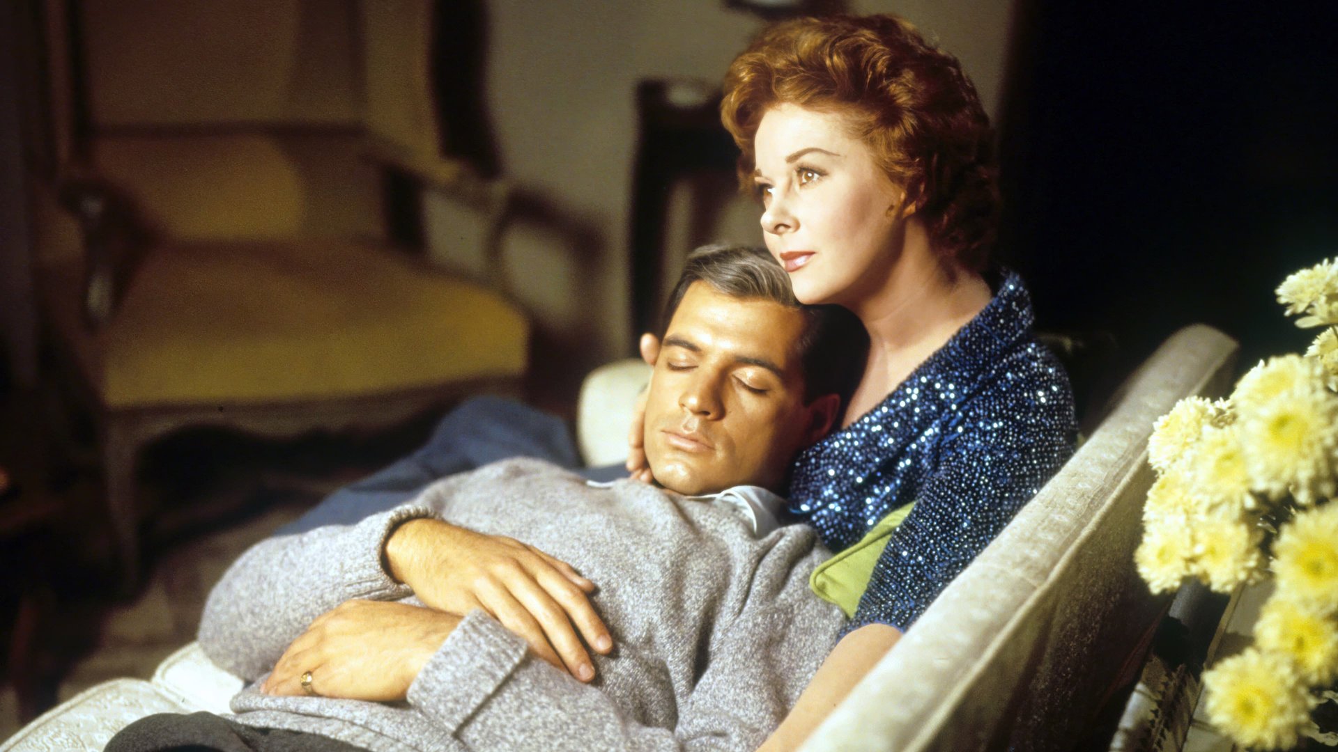 Cinematic background from Back Street 1961 - Ambitious but thwarted, Rae Smith meets handsome Marine Paul Saxon, (of the Saxon department store chain), as he passes through Lincoln, Nebraska, on his way home from World War II. There's a definite spark between them but circumstances intervene and he leaves town without her. Later she learns he's married. Determined to make it as a fashion designer, Rae moves to New York and becomes a great success. One day she happens to meet Paul again and again there's that spark but he's still married so, as a form of escape, Rae moves to Rome to set up shop. Once again she meets Paul and finally they begin an actual affair since Paul's shrewish, drunken wife, Liz, won't give him a divorce. Time passes, the affair continues whenever time and place permit, but then, Paul's young son finds out about Rae and Rae's back-street world begins to crumble.