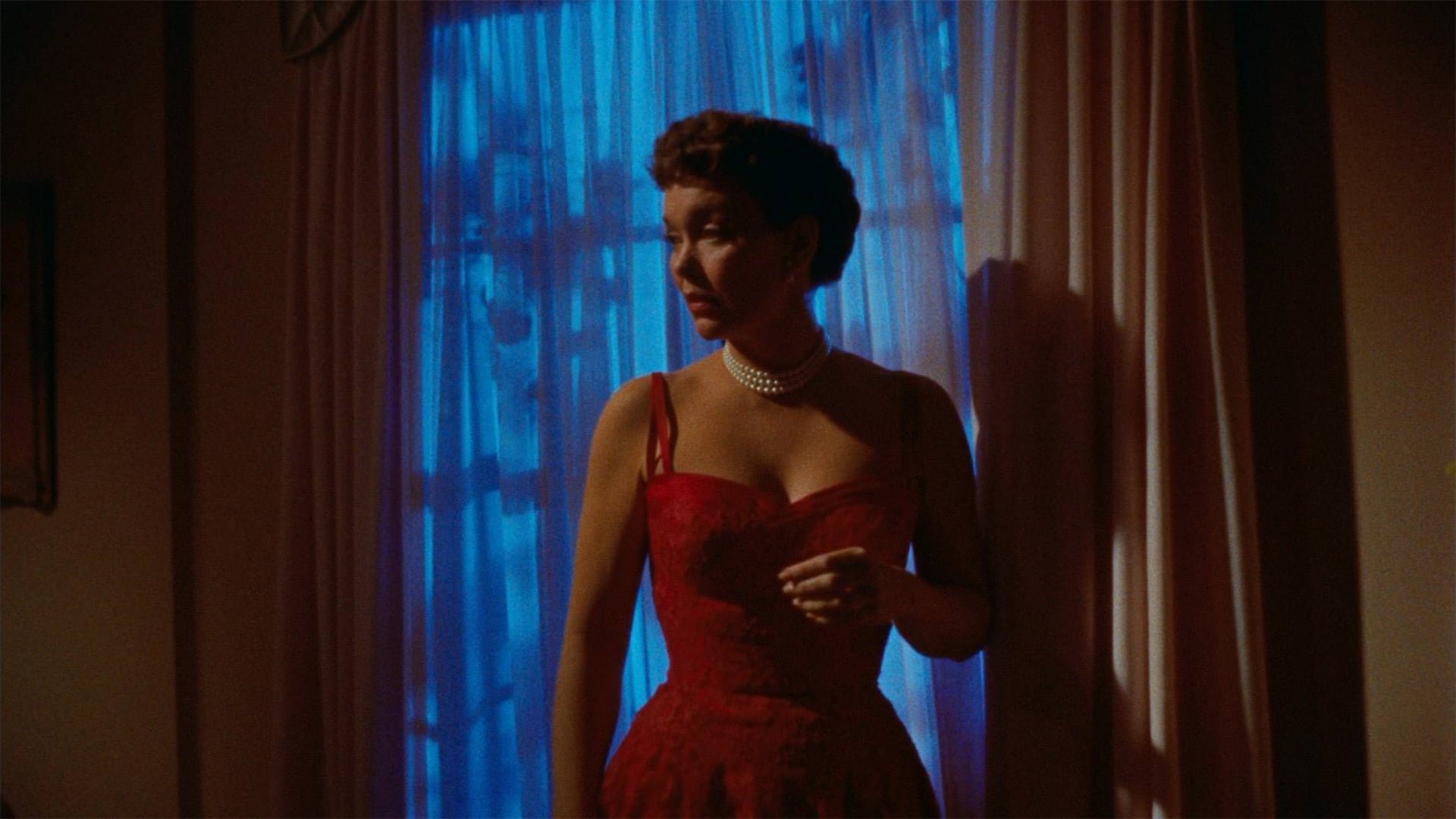 Cinematic background from All That Heaven Allows 1955 - Two different social classes collide when Cary Scott, a wealthy upper-class widow, falls in love with her much younger and down-to-earth gardener, prompting disapproval and criticism from her children and country club friends.