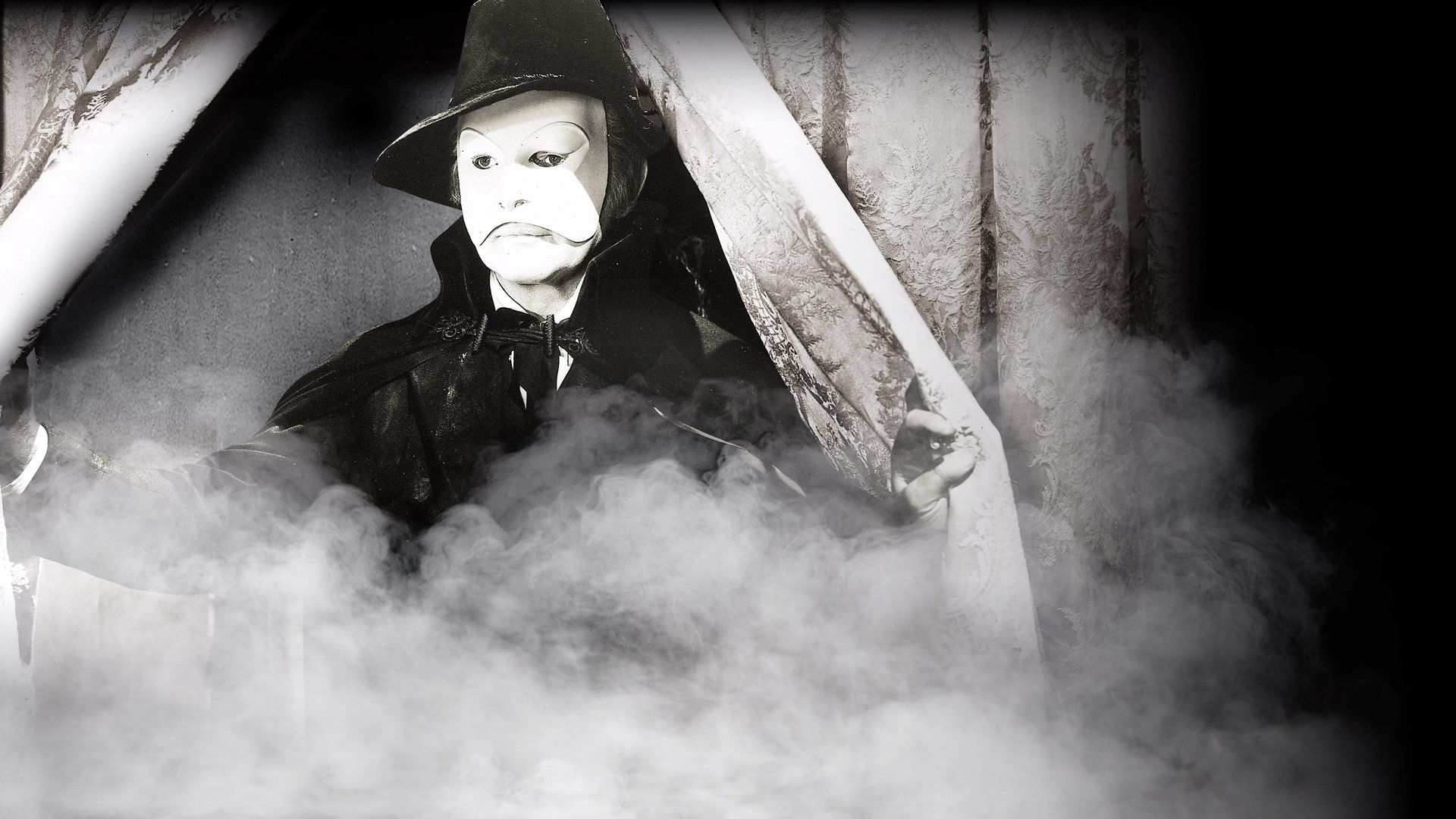 Cinematic background from Phantom of the Opera 1943 - Pit violinist Claudin hopelessly loves rising operatic soprano Christine Dubois (as do baritone Anatole and police inspector Raoul) and secretly aids her career. But Claudin loses both his touch and his job, murders a rascally music publisher in a fit of madness, and has his face etched with acid. Soon, mysterious crimes plague the Paris Opera House, blamed on a legendary "phantom".