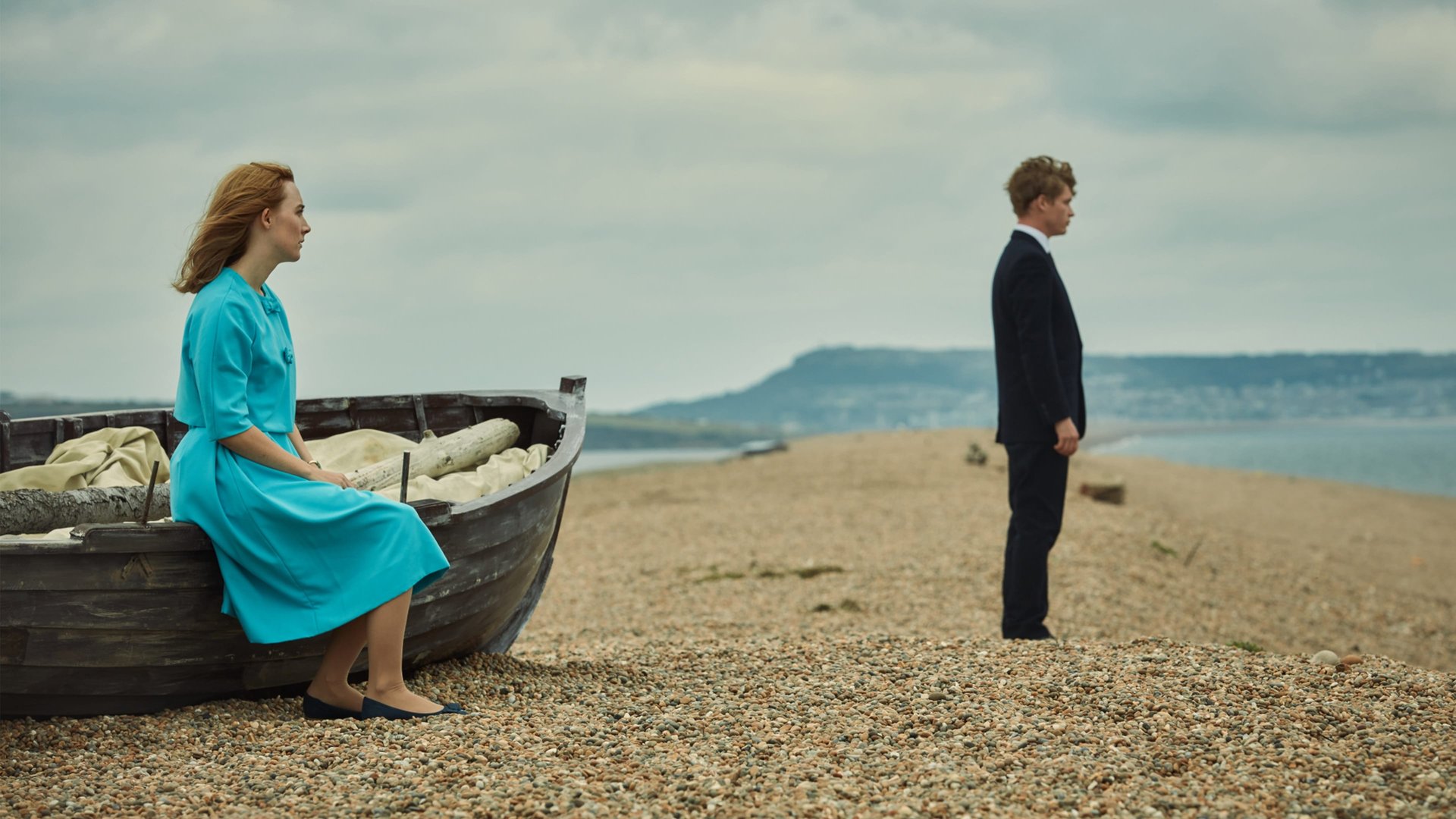 Cinematic background from On Chesil Beach 2017 - In 1962 England, a young couple finds their idyllic romance colliding with issues of sexual freedom and societal pressure, leading to an awkward and fateful wedding night.
