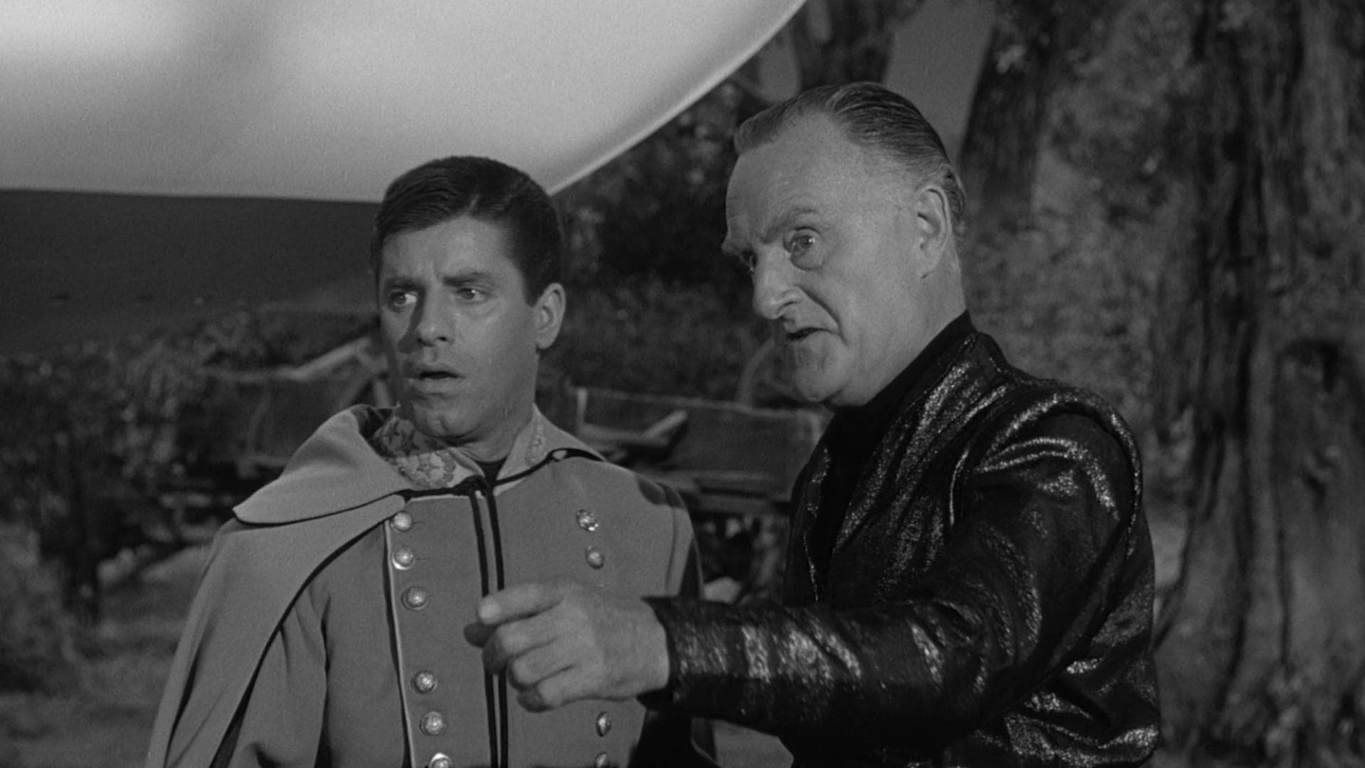 Cinematic background from Visit to a Small Planet 1960 - The weirdest alien of the galaxy pays a visit to Earth...  Jerry Lewis is Kreton, a childish alien who, against his teacher's will leaves his planet to visit the Earth, and lands in the backyard of a famous television journalist who doesn't believe in UFOs and aliens. Wanting to study humans but not able to fully understand them, Kreton makes a mess out of it, generating a lot of comic situations.