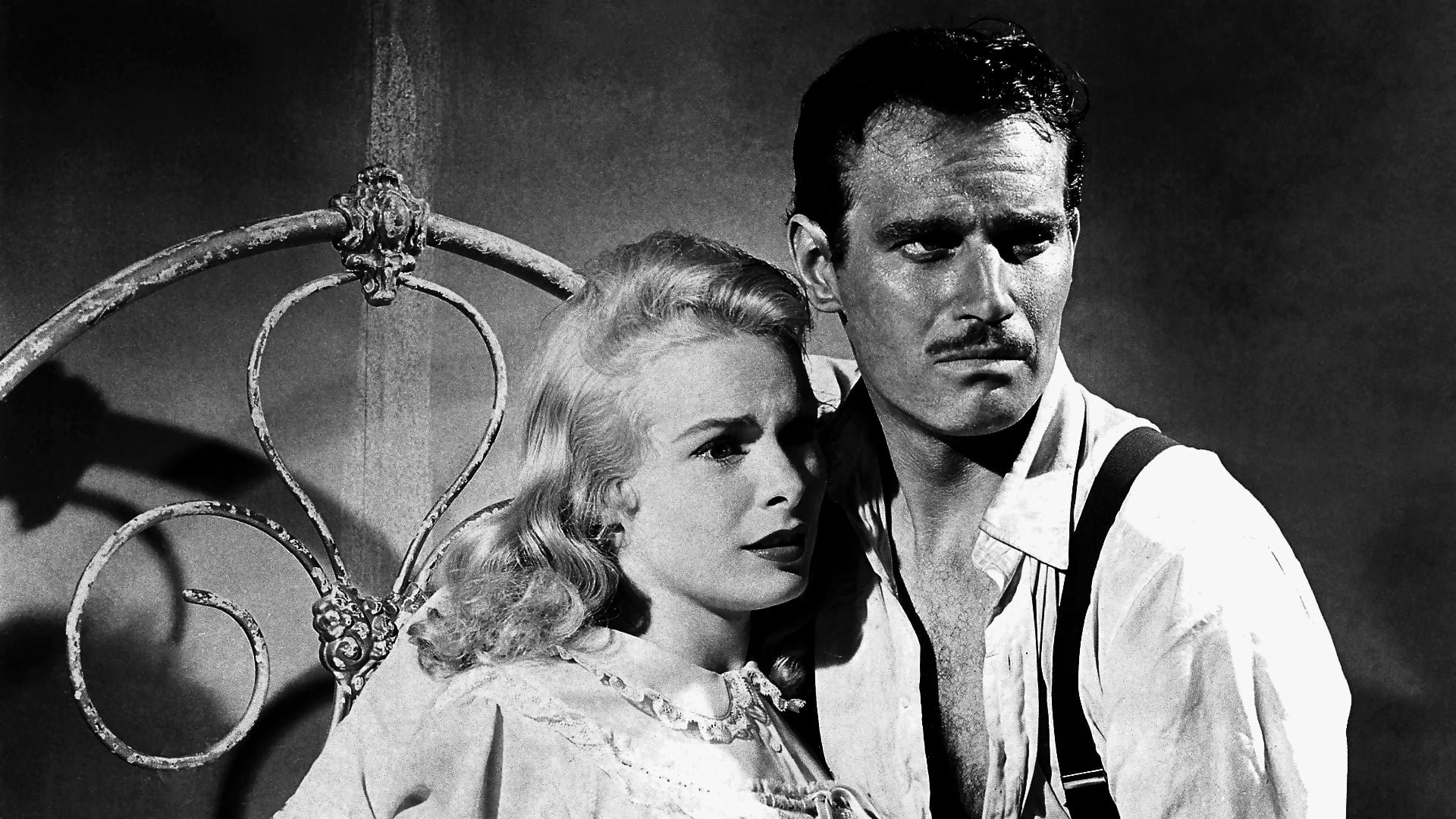 Cinematic background from Touch of Evil 1958 - When a car bomb explodes on the American side of the U.S./Mexico border, Mexican drug enforcement agent Miguel Vargas begins his investigation, along with American police captain Hank Quinlan. When Vargas begins to suspect that Quinlan and his shady partner, Menzies, are planting evidence to frame an innocent man, his investigations into their possible corruption quickly put himself and his new bride, Susie, in jeopardy.