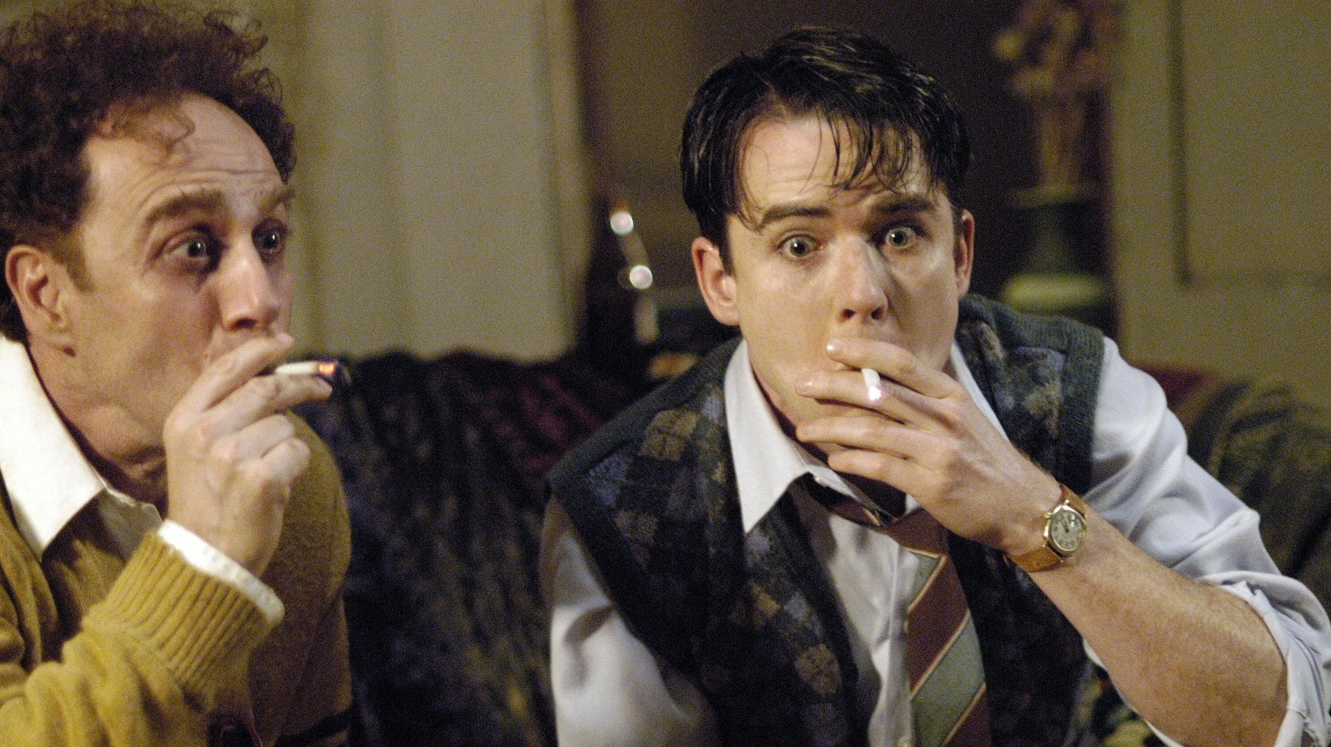 Cinematic background from Reefer Madness: The Movie Musical 2005 - This film tells the tale of the Harper Affair, in which young Jimmy Harper finds his life of promise turn into a life of debauchery and murder thanks to the new drug menace marijuana. Along the way he receives help from his girlfriend Mary and Jesus himself, but always finds himself in the arms of the Reefer Man and the rest of the denizens of the Reefer Den.