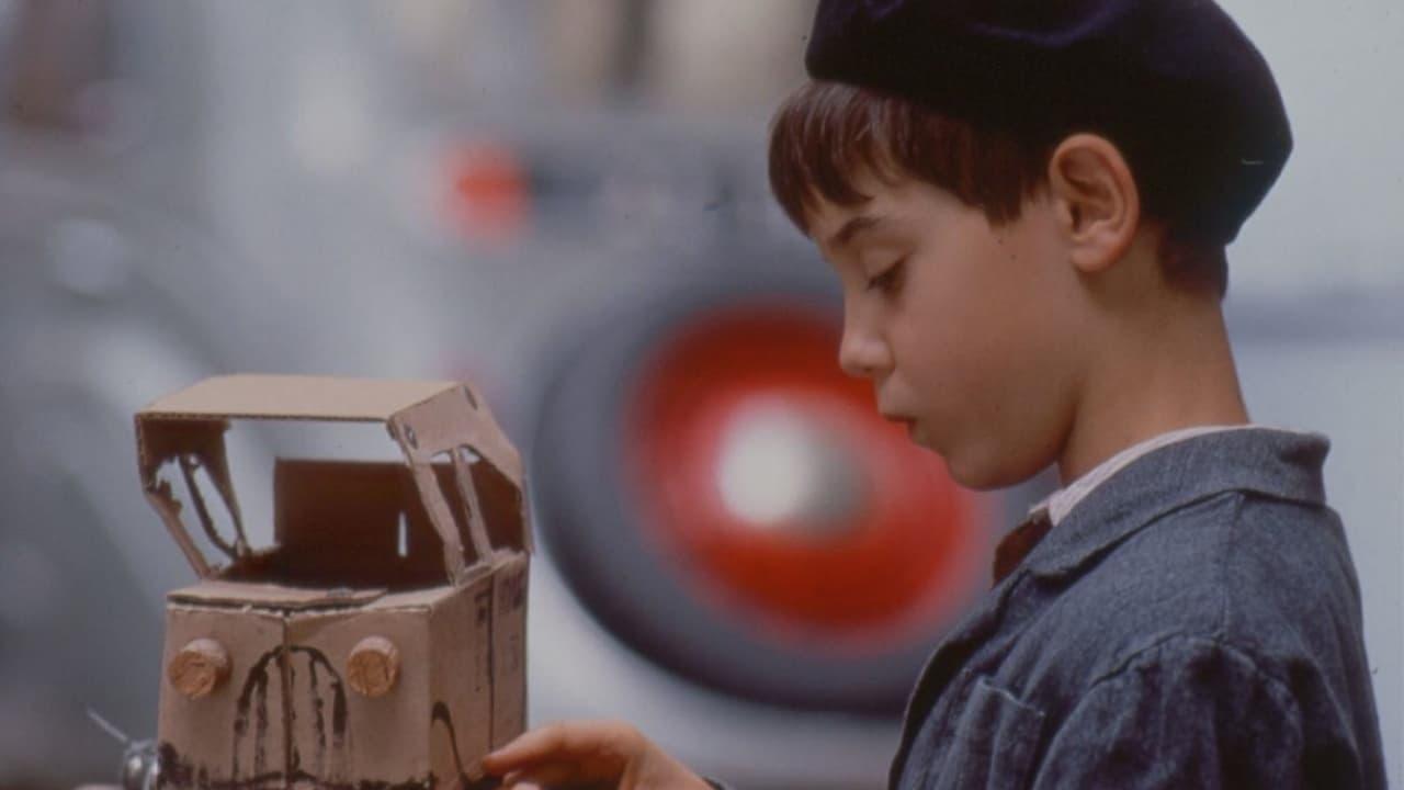 Cinematic background from Jacquot of Nantes 1991 - Jacquot Demy is a little boy at the end of the thirties. His father owns a garage and his mother is a hairdresser. The whole family lives happily and likes to sing and to go to the movies. Jacquot is fascinated by every kind of show (theatre, cinema, puppets). He buys a camera to shoot his first amateur film... An evocation of French cineast Jacques Demy's childhood and vocation for the cinema and the musicals.