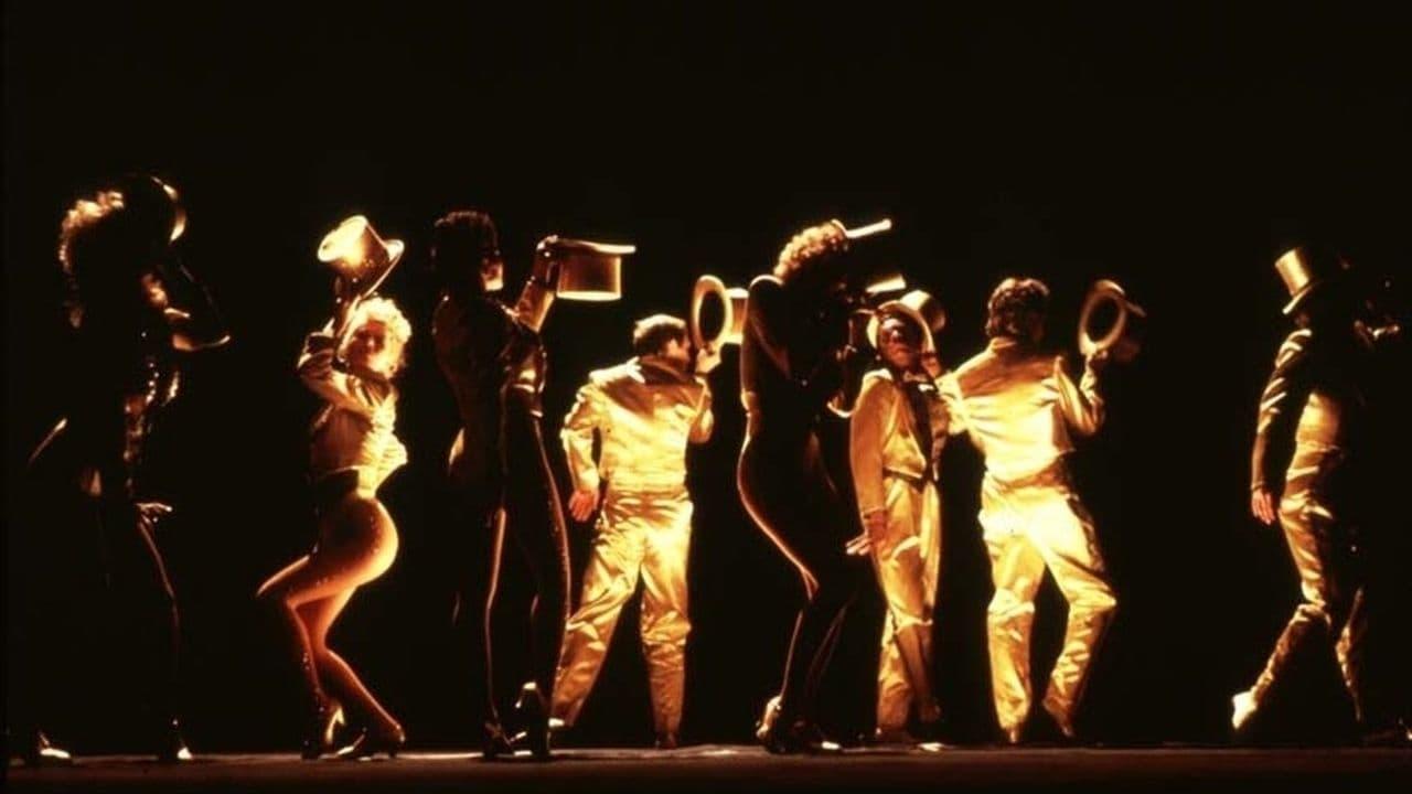Cinematic background from A Chorus Line 1985 - A group of dancers congregate on the stage of a Broadway theatre to audition for a new musical production directed by Zach. After the initial eliminations, seventeen hopefuls remain, among them Cassie, who once had a tempestuous romantic relationship with Zach. She is desperate enough for work to humble herself and audition for him; whether he's willing to let professionalism overcome his personal feelings about their past remains to be seen.
