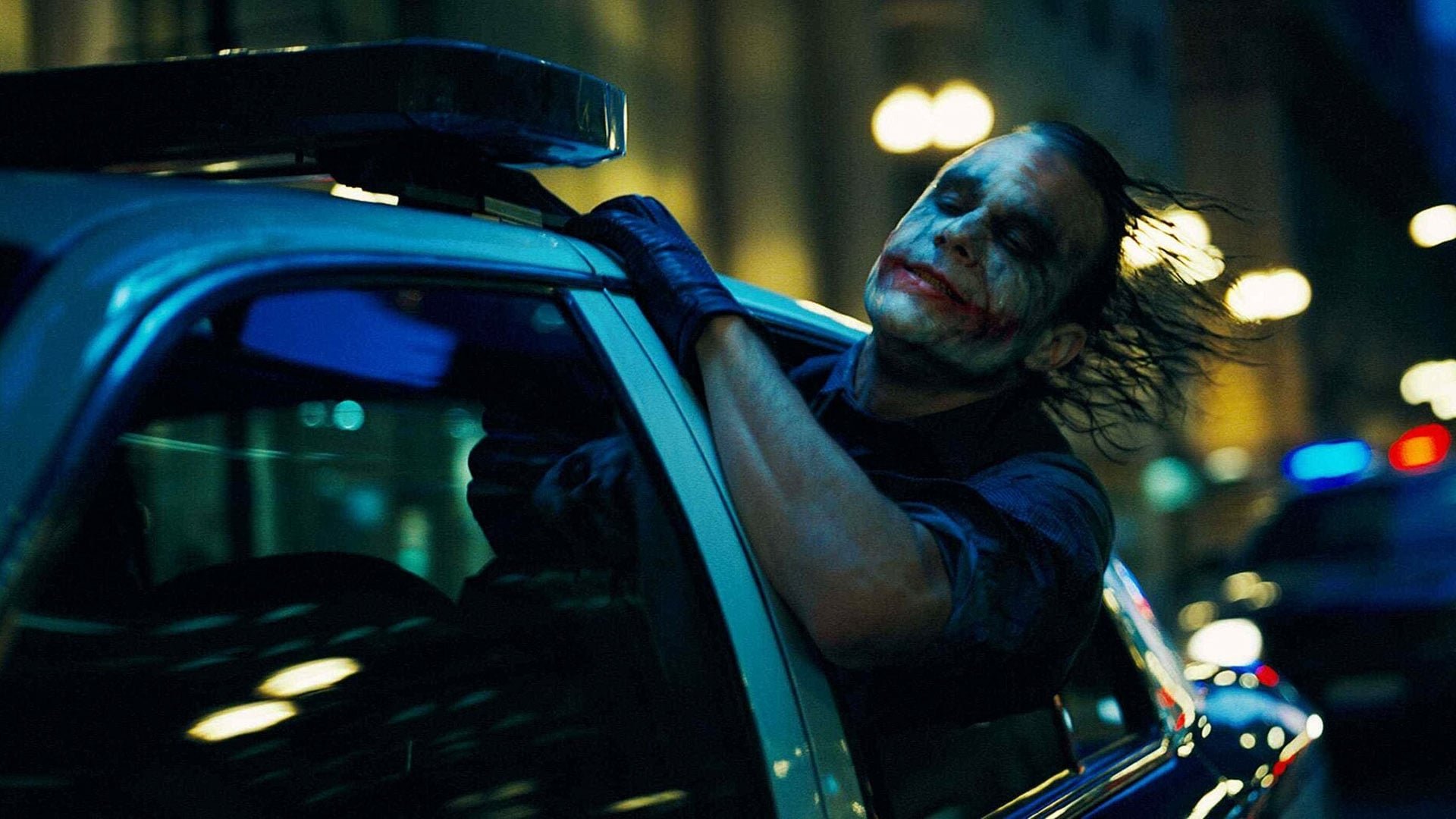 Cinematic background from The Dark Knight 2008 - Batman raises the stakes in his war on crime. With the help of Lt. Jim Gordon and District Attorney Harvey Dent, Batman sets out to dismantle the remaining criminal organizations that plague the streets. The partnership proves to be effective, but they soon find themselves prey to a reign of chaos unleashed by a rising criminal mastermind known to the terrified citizens of Gotham as the Joker.