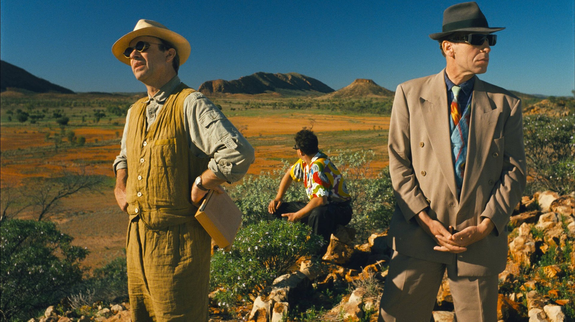 Cinematic background from Until the End of the World 1991 - In 1999, a woman's life is forever changed after she survives a car crash with two bank robbers, who enlist her help to take the money to a drop in Paris. On the way, she runs into another fugitive from the law — an American doctor on the run from the CIA. They want to confiscate his father's invention – a device which allows anyone to record their dreams and visions.