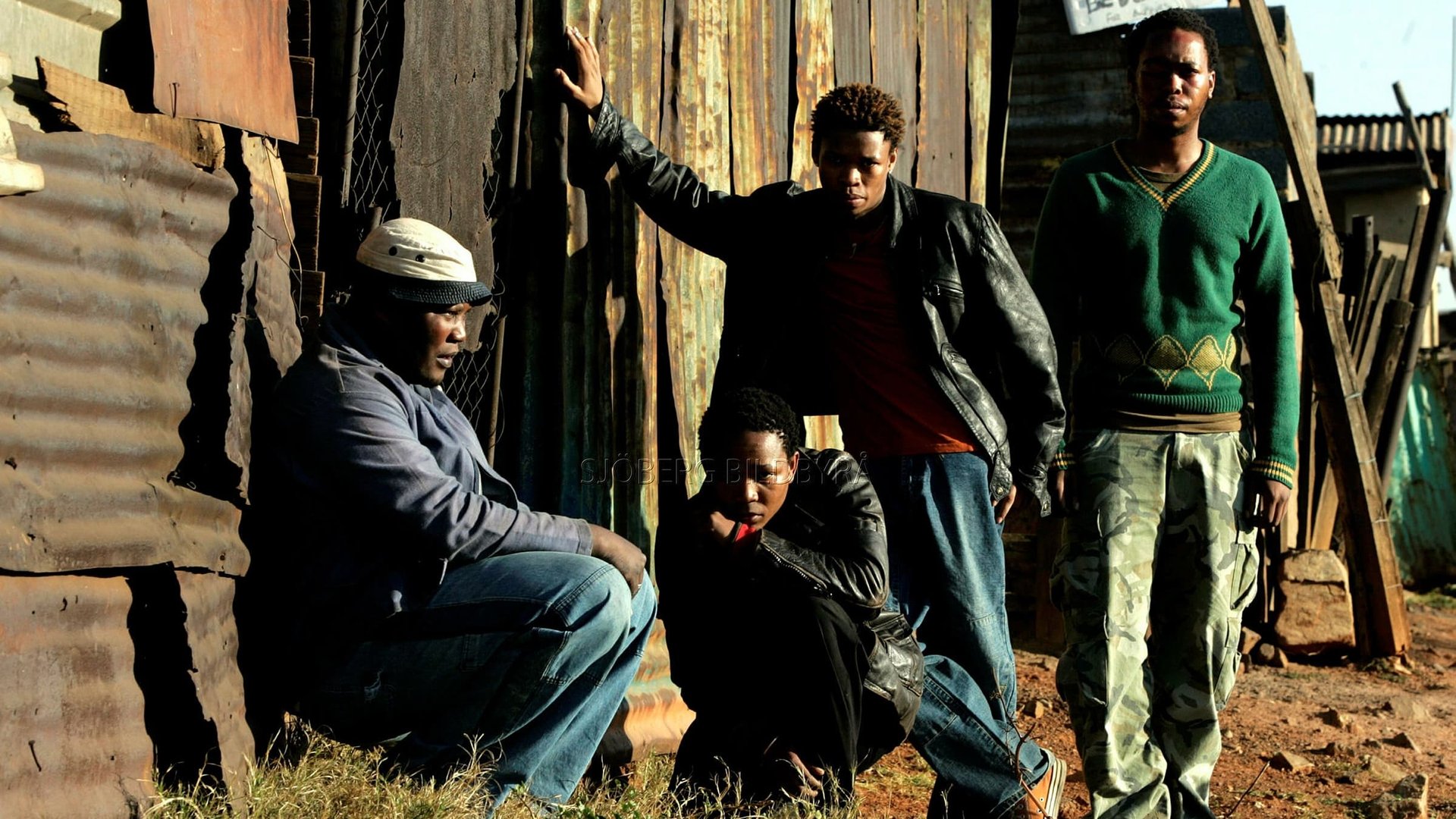 Cinematic background from Tsotsi 2005 - The South African multi-award winning film about a young South African boy from the ghetto named Tsotsi, meaning Gangster. Tsotsi, who left home as a child to get away from helpless parents, finds a baby in the back seat of a car that he has just stolen. He decides that it his responsibility to take care of the baby and in the process learns that maybe the gangster life isn’t the best way.