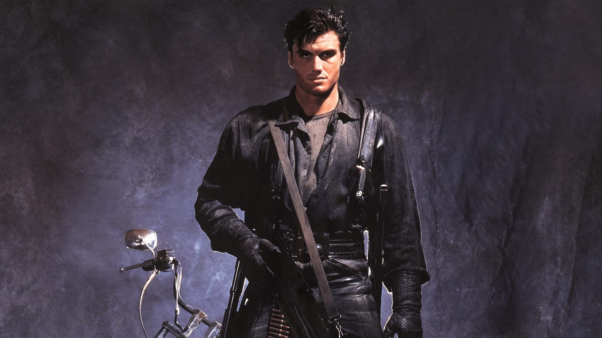Cinematic background from The Punisher 1989 - The avenging angel of Marvel Comics fame comes brilliantly to life in this searing action-adventure thriller! Dolph Lundgren stars as Frank Castle, a veteran cop who loses his entire family to a mafia car bomb. His ex-partner believes Castle survived the blast and became the Punisher, living in the sewers and exacting vigilante violence against mob bosses throughout the city. When the populace is caught in the midst of a gang war that he caused, Castle must again emerge from the shadows and save the innocent.