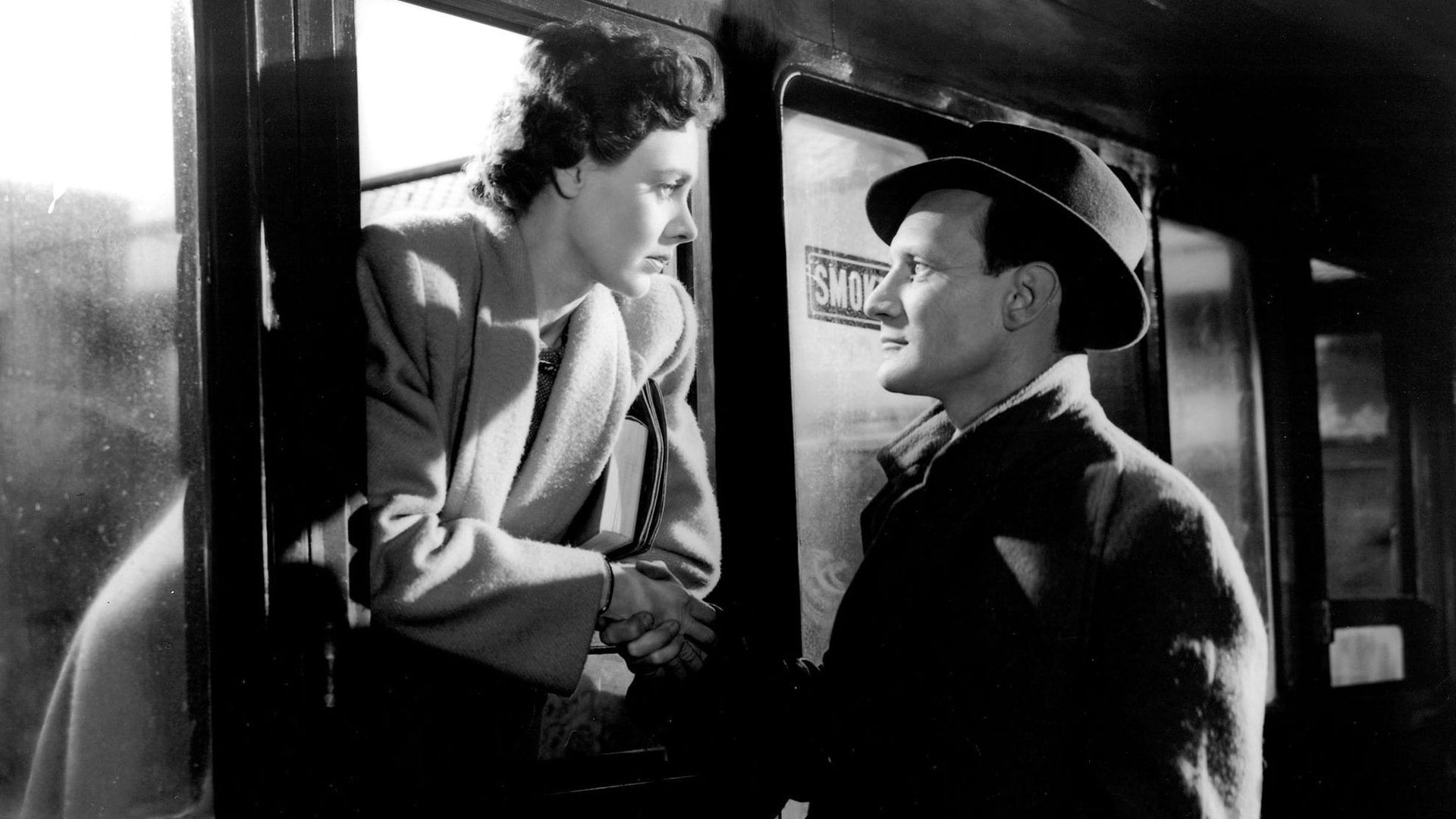 Cinematic background from Brief Encounter 1945 - Returning home from a shopping trip to a nearby town, bored suburban housewife Laura Jesson is thrown by happenstance into an acquaintance with virtuous doctor Alec Harvey. Their casual friendship soon develops during their weekly visits into something more emotionally fulfilling than either expected, and they must wrestle with the potential havoc their deepening relationship would have on their lives and the lives of those they love.