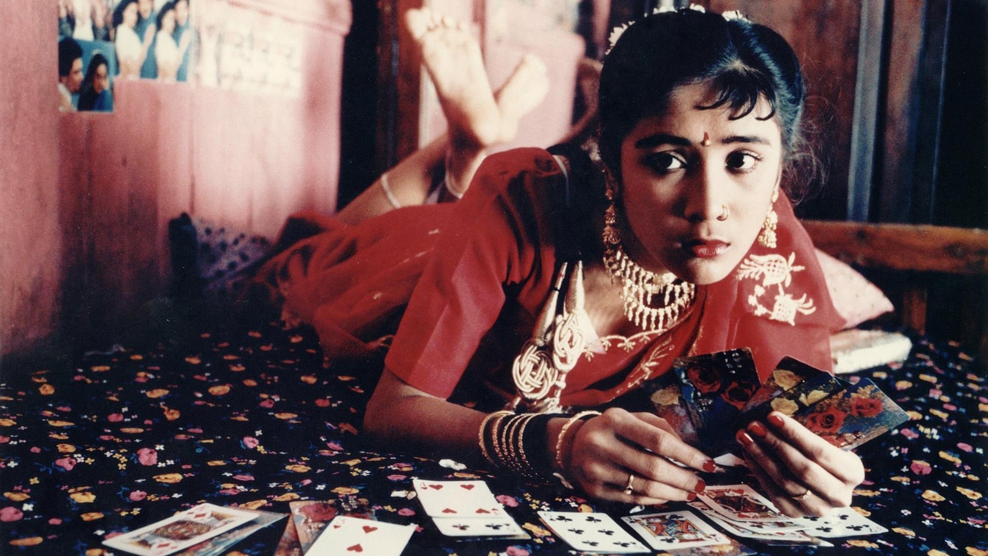 Cinematic background from Salaam Bombay! 1988 - After destroying his older brother's motorbike in retaliation for his constant bullying, 11-year-old Krishna is sent to a traveling circus to earn money to pay for the bike's repairs, but soon winds up in the streets of Bombay's poorest slums. There, he befriends the drug dealer Chillum and young prostitute Sola Saal, while trying to make enough money at a neighborhood tea stall to repay his debt to his family.