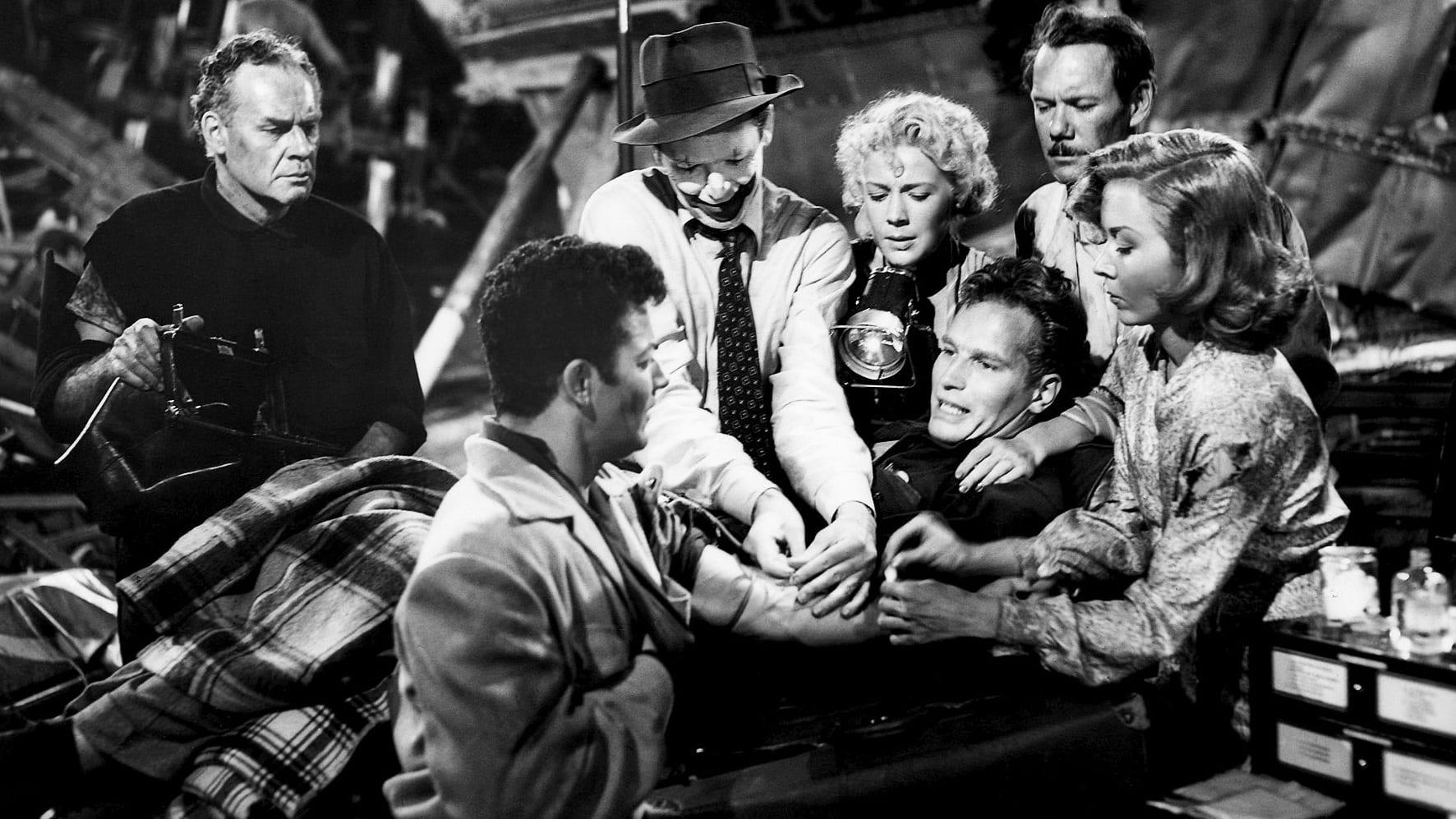 Cinematic background from The Greatest Show on Earth 1952 - To ensure a full profitable season, circus manager Brad Braden engages The Great Sebastian, though this moves his girlfriend Holly from her hard-won center trapeze spot. Holly and Sebastian begin a dangerous one-upmanship duel in the ring, while he pursues her on the ground.