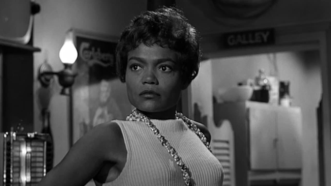 Cinematic background from Anna Lucasta 1958 - Anna Lucasta has been walking the streets in San Diego since being thrown out of home, at 19, by her alcoholic father, Joe. She's estranged from her family, but when her father and brother-in-law see greedy potential in an arranged marriage to affluent Rudolph, Anna is called back home. Old wounds have hardly healed, though. Just as Anna starts to feel for Rudolph, Danny, an old friend, returns to make life difficult.