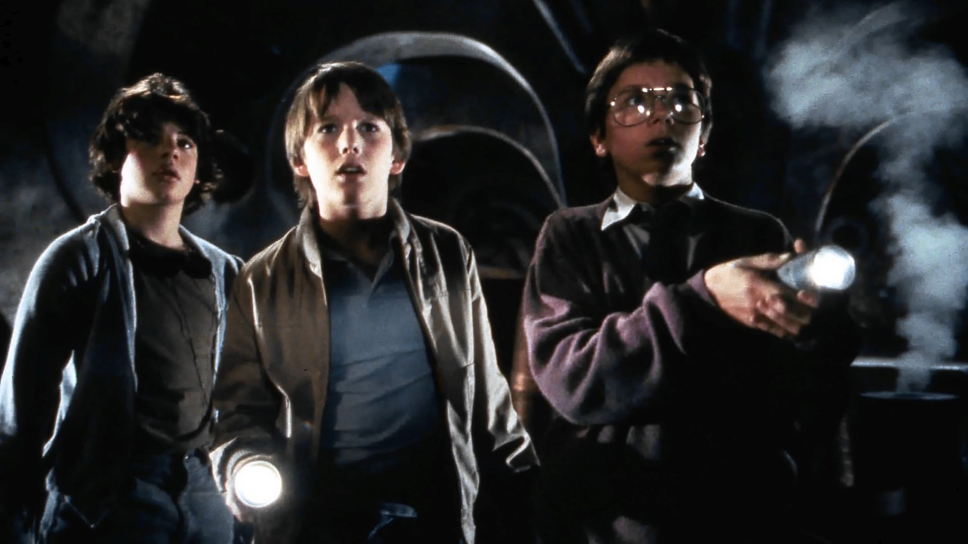 Cinematic background from Explorers 1985 - Middle schooler Ben spends his free time watching sci-fi films, playing video games and reading comic books. Surprisingly, his affinity for all things fantastical yields a real result – when he has a vivid dream about technology, his prodigy best friend Wolfgang manages to create a working spacecraft. Joined by their buddy Darren, the boys take off into outer space and encounter some very odd extraterrestrial life.