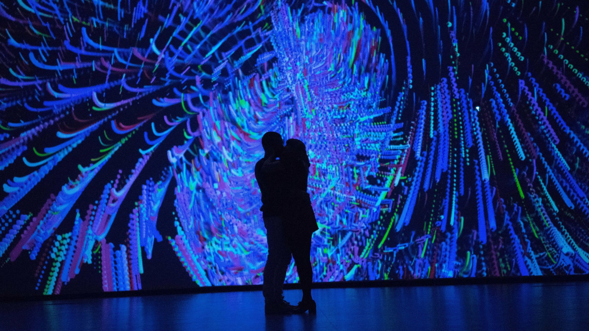 Cinematic background from Zoe 2018 - Two colleagues at a revolutionary research lab design technology to improve and perfect romantic relationships. As their work progresses, their discoveries become more profound.