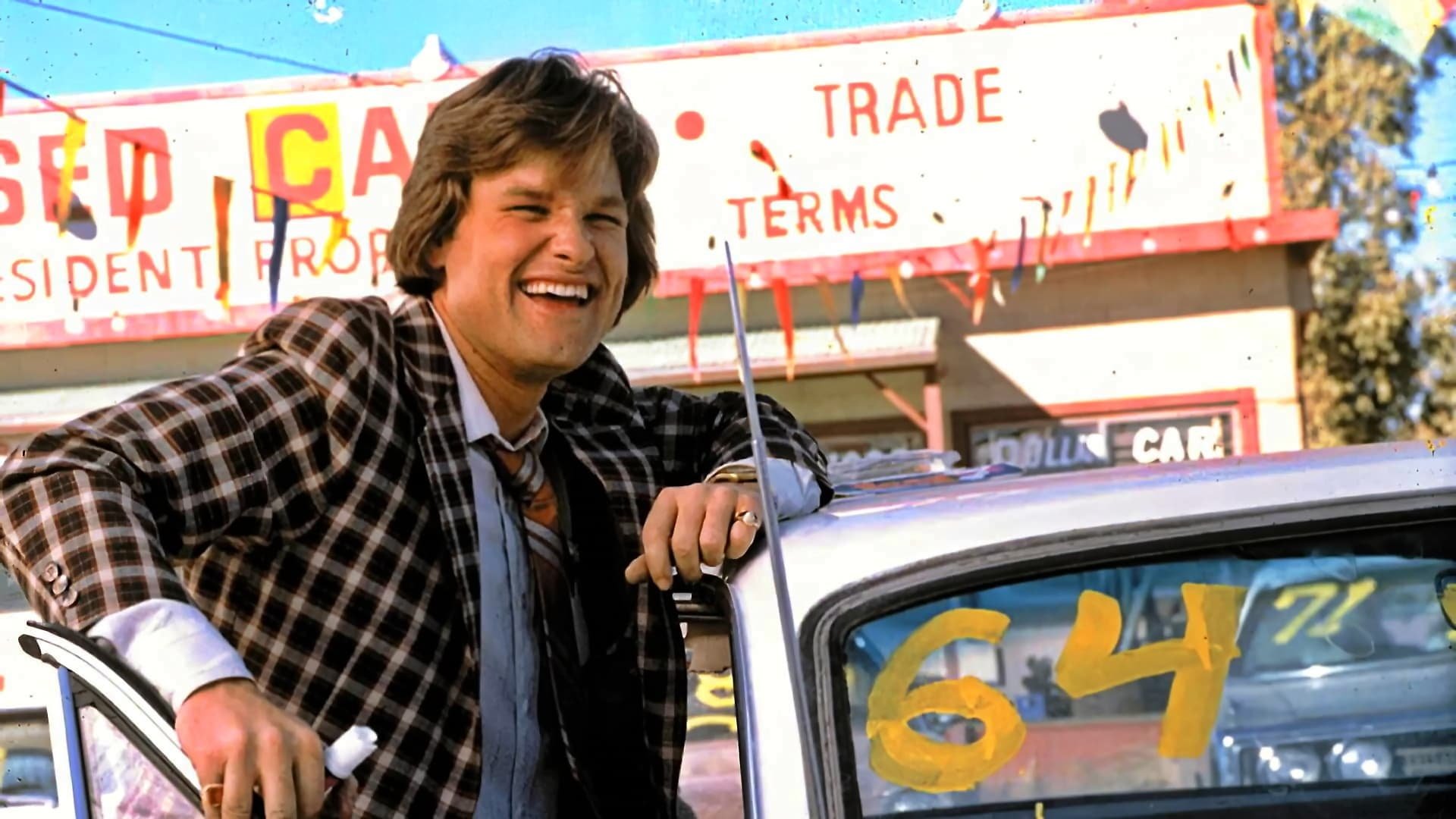 Cinematic background from Used Cars 1980 - When the owner of a struggling used car lot is killed, it's up to the lot's hot-shot salesman to save the property from falling into the hands of the owner's ruthless brother and used-car rival.