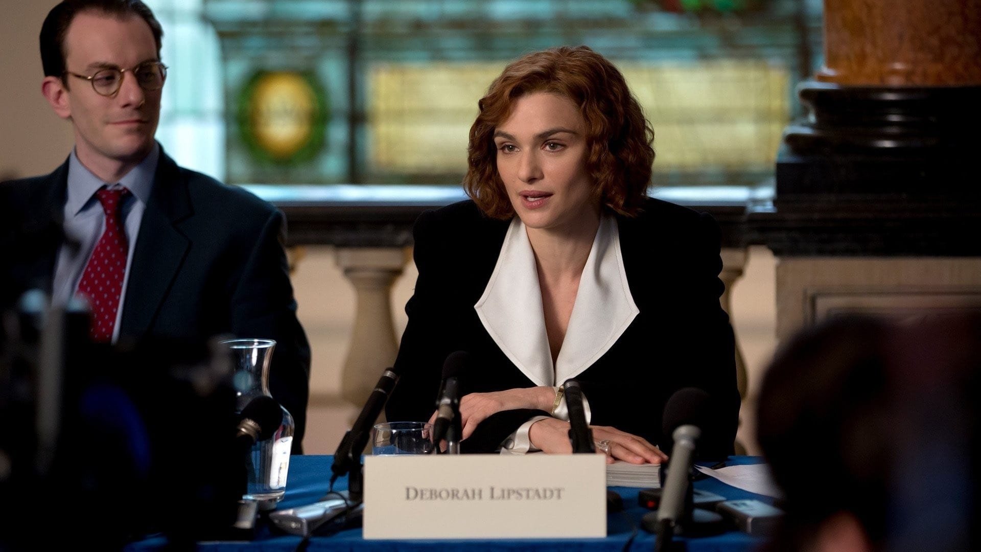 Cinematic background from Denial 2016 - Acclaimed writer and historian Deborah E. Lipstadt must battle for historical truth to prove the Holocaust actually occurred when David Irving, a renowned denier, sues her for libel.