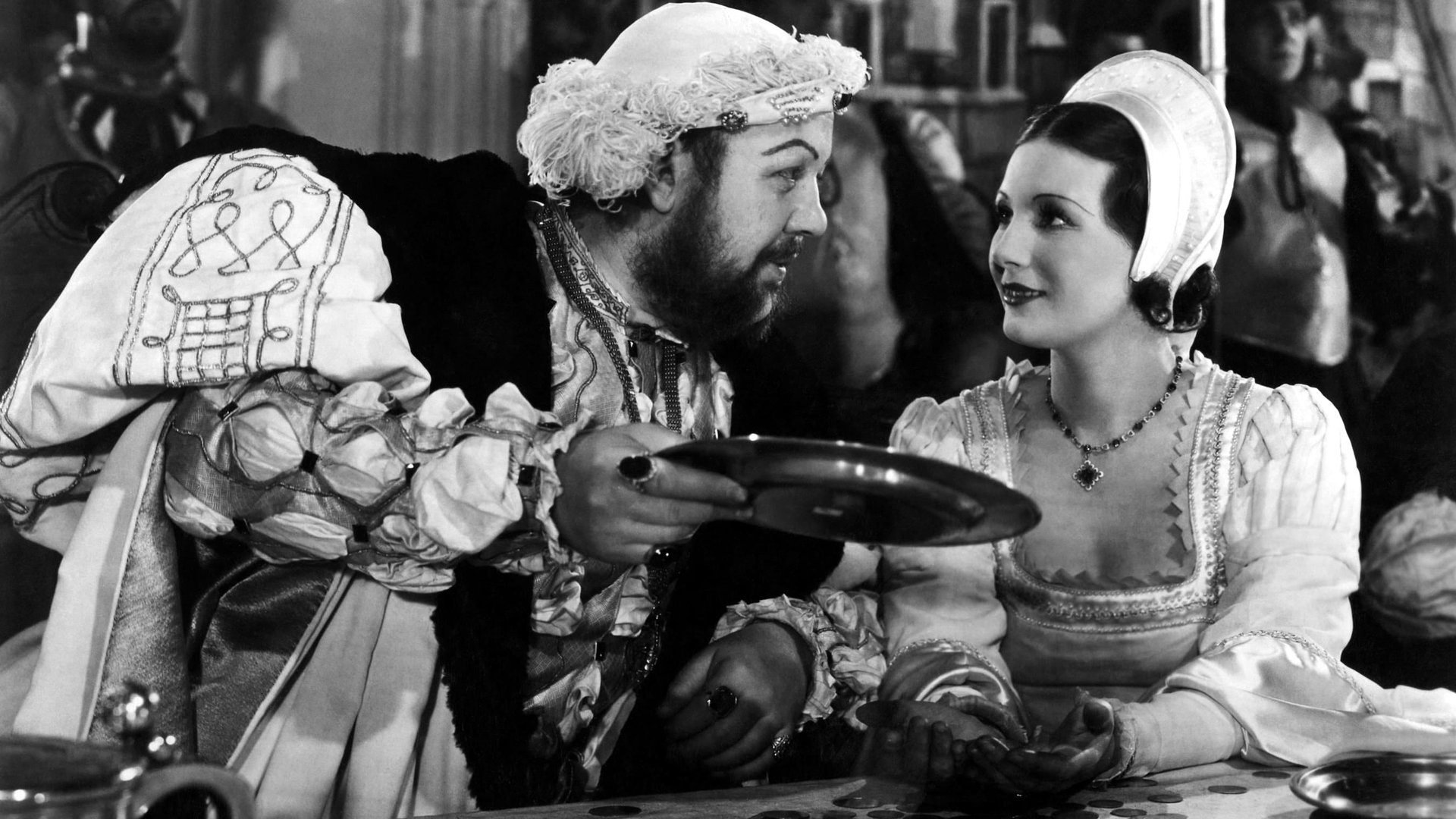 Cinematic background from The Private Life of Henry VIII 1933 - Renowned for his excess, King Henry VIII goes through a series of wives during his rule. With Anne Boleyn, his second wife, executed on charges of treason, King Henry weds maid Jane Seymour, but that marriage also ends in tragedy. Not one to be single for long, the king picks German-born Anne of Cleves as his bride, but their union lasts only months before an annulment is granted, and King Henry continues his string of spouses.