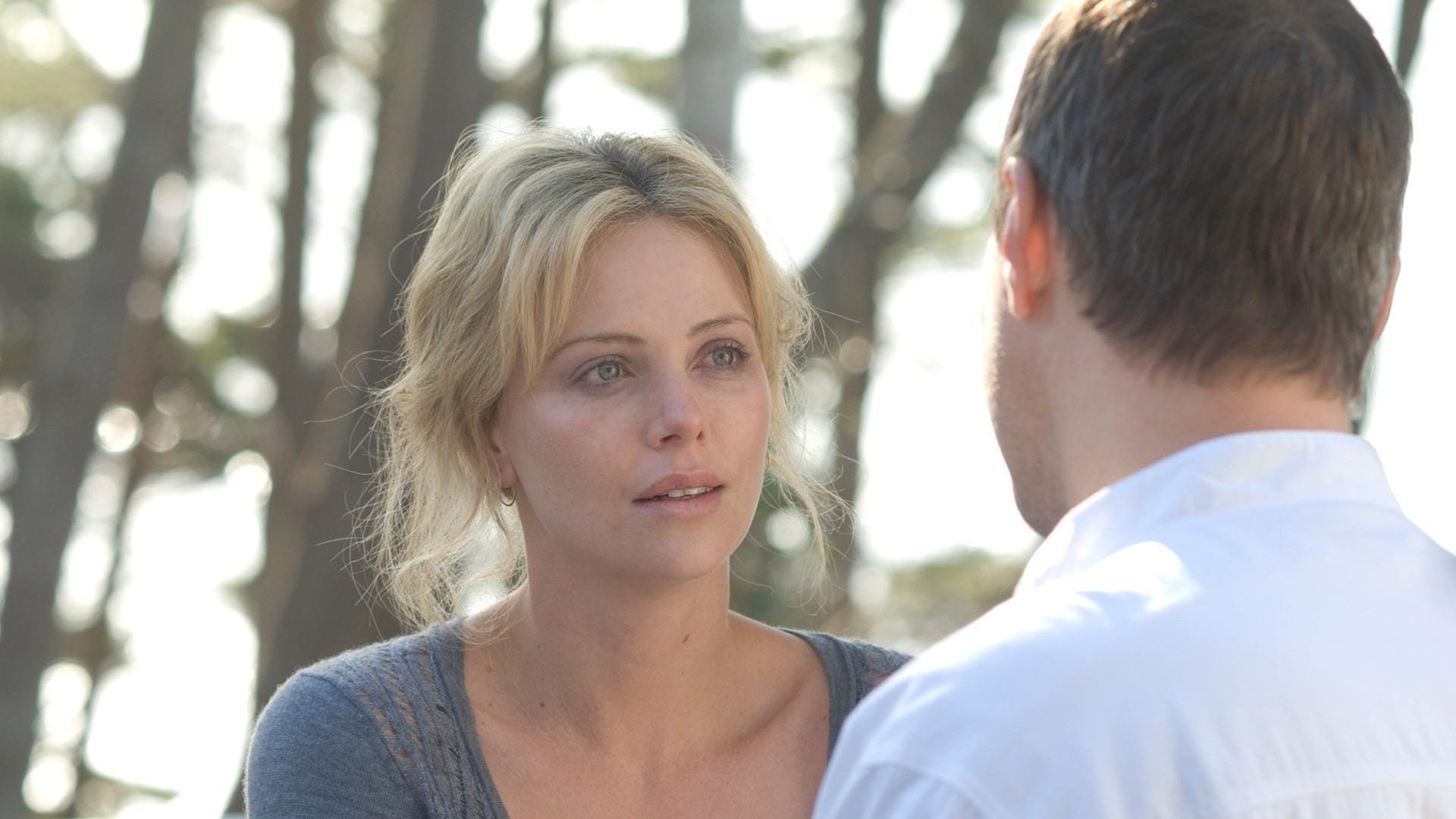 Cinematic background from The Burning Plain 2008 - A trailer is burning in the middle of a plain. The bodies of two adulterous lovers are found. Scenes from both families, before and after the dramatic events, suggest an unusual connection between them. But what is their secret?