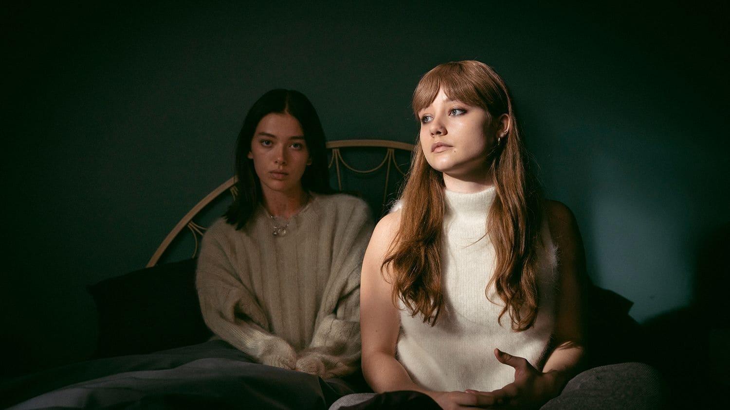 Cinematic background from A Banquet 2021 - Widowed mother Holly is radically tested when her teenage daughter Betsey experiences a profound enlightenment and insists that her body is no longer her own, but in service to a higher power. Bound to her newfound faith, Betsey refuses to eat but loses no weight. In an agonizing dilemma, torn between love and fear, Holly is forced to confront the boundaries of her own beliefs.