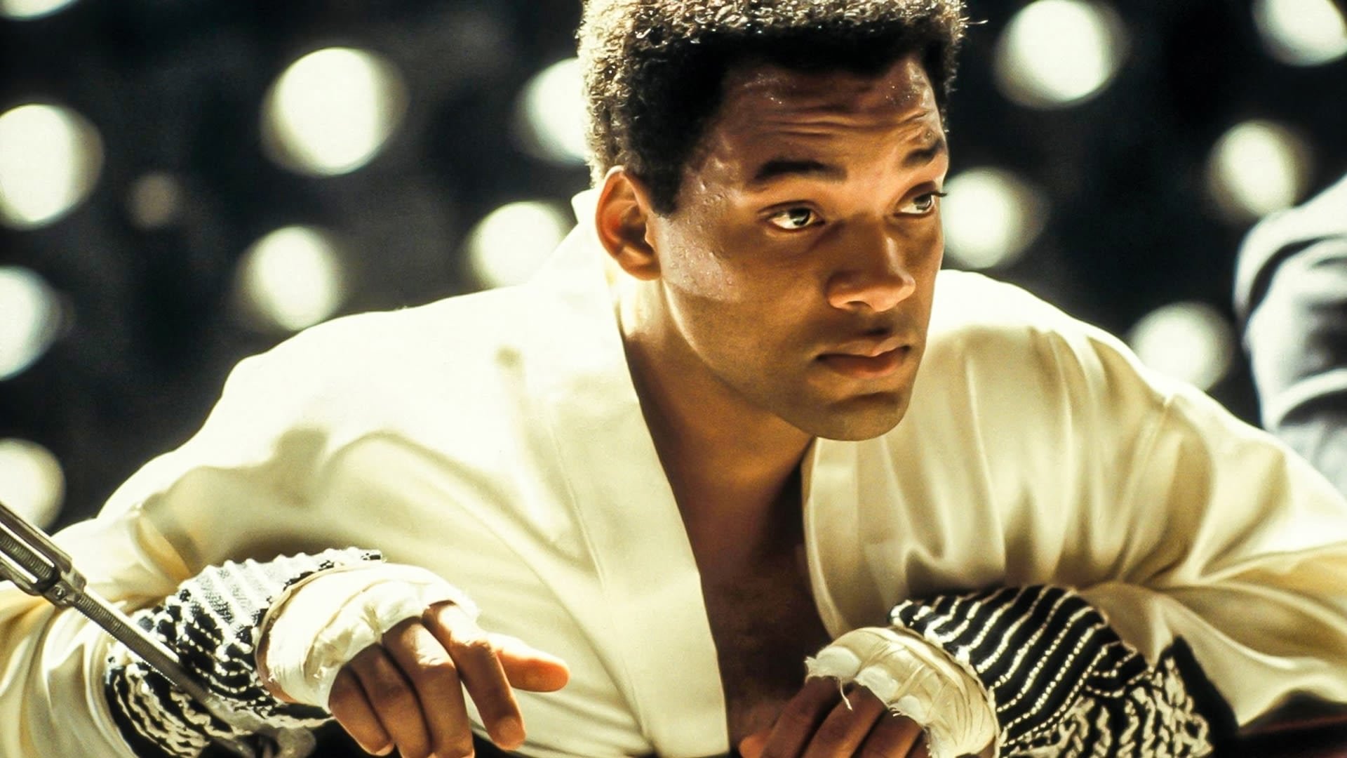 Cinematic background from Ali 2001 - In 1964, a brash, new pro boxer, fresh from his Olympic gold medal victory, explodes onto the scene: Cassius Clay. Bold and outspoken, he cuts an entirely new image for African Americans in sport with his proud public self-confidence and his unapologetic belief that he is the greatest boxer of all time. Yet at the top of his game, both Ali's personal and professional lives face the ultimate test.