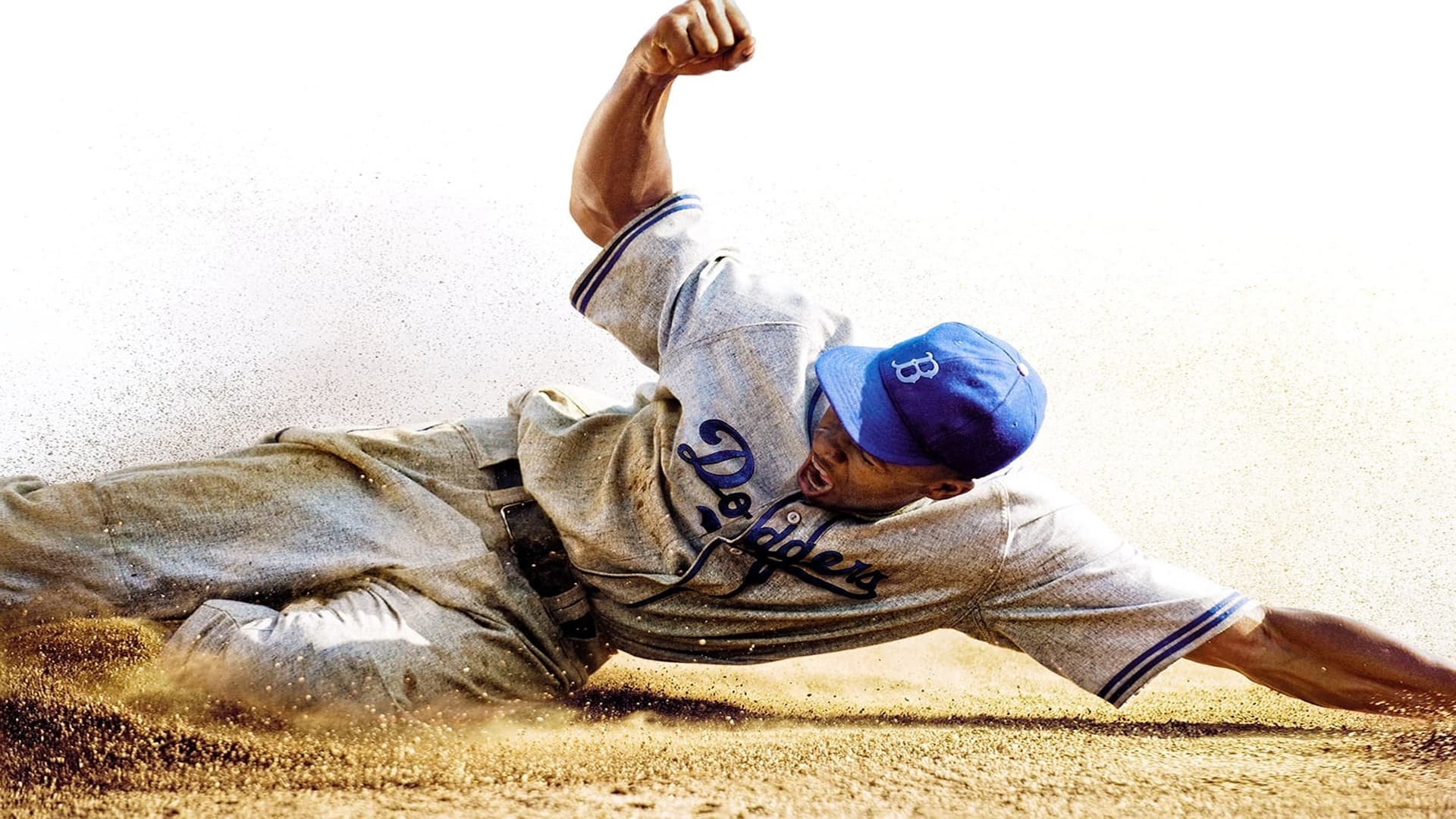 Cinematic background from 42 2013 - In 1946, Branch Rickey (Harrison Ford), owner of the Brooklyn Dodgers, took a stand against Major League Baseball's infamous colour line when he signed Jackie Robinson (Chadwick Boseman) to the team. The deal put both men in the crosshairs of the public, the press and even other players. Facing unabashed racism from every side, Robinson was forced to demonstrate tremendous courage and let his talent on the field wins over fans and his teammates – silencing his critics and forever changing the world by changing the game of baseball.