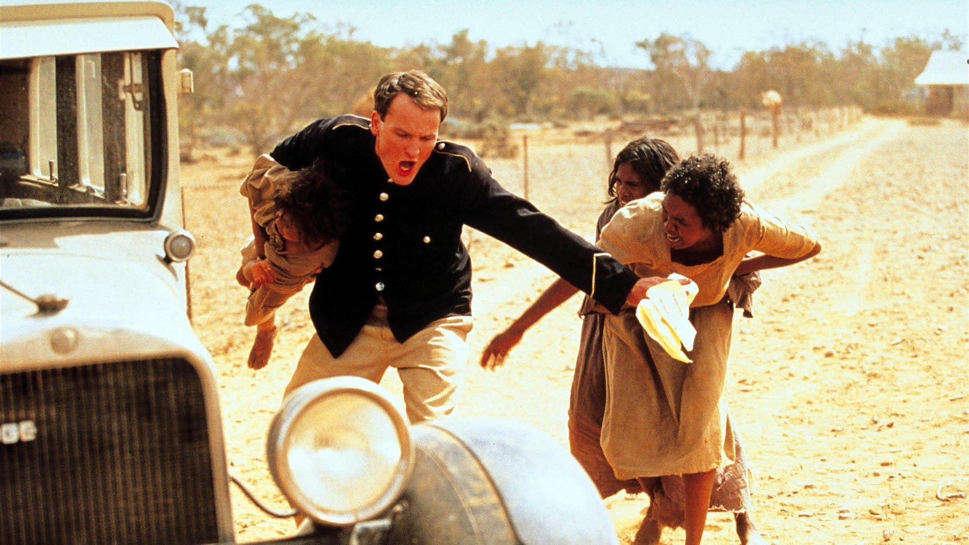 Cinematic background from Rabbit-Proof Fence 2002 - In 1931, three Aboriginal girls escape after being plucked from their homes to be trained as domestic staff, and set off on a trek across the Outback.